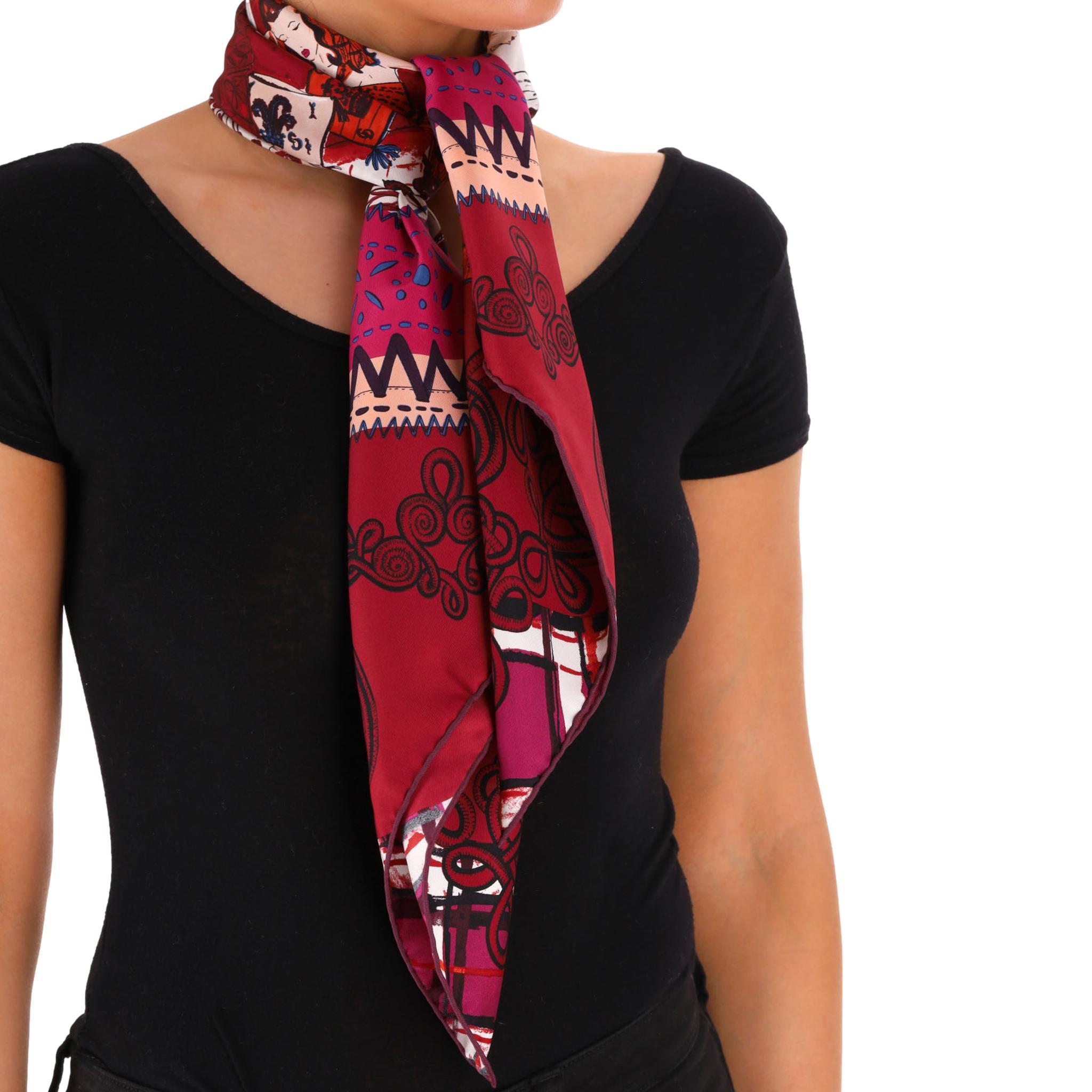 Christian Dior Printed Silk Carre Scarf

Square scarf crafted from silk in the shades of pink and red with a vintage style scene in a centre.

Featuring decorative, geometric design to the borders and 'Christian Dior Paris' signature detail.

Rrp