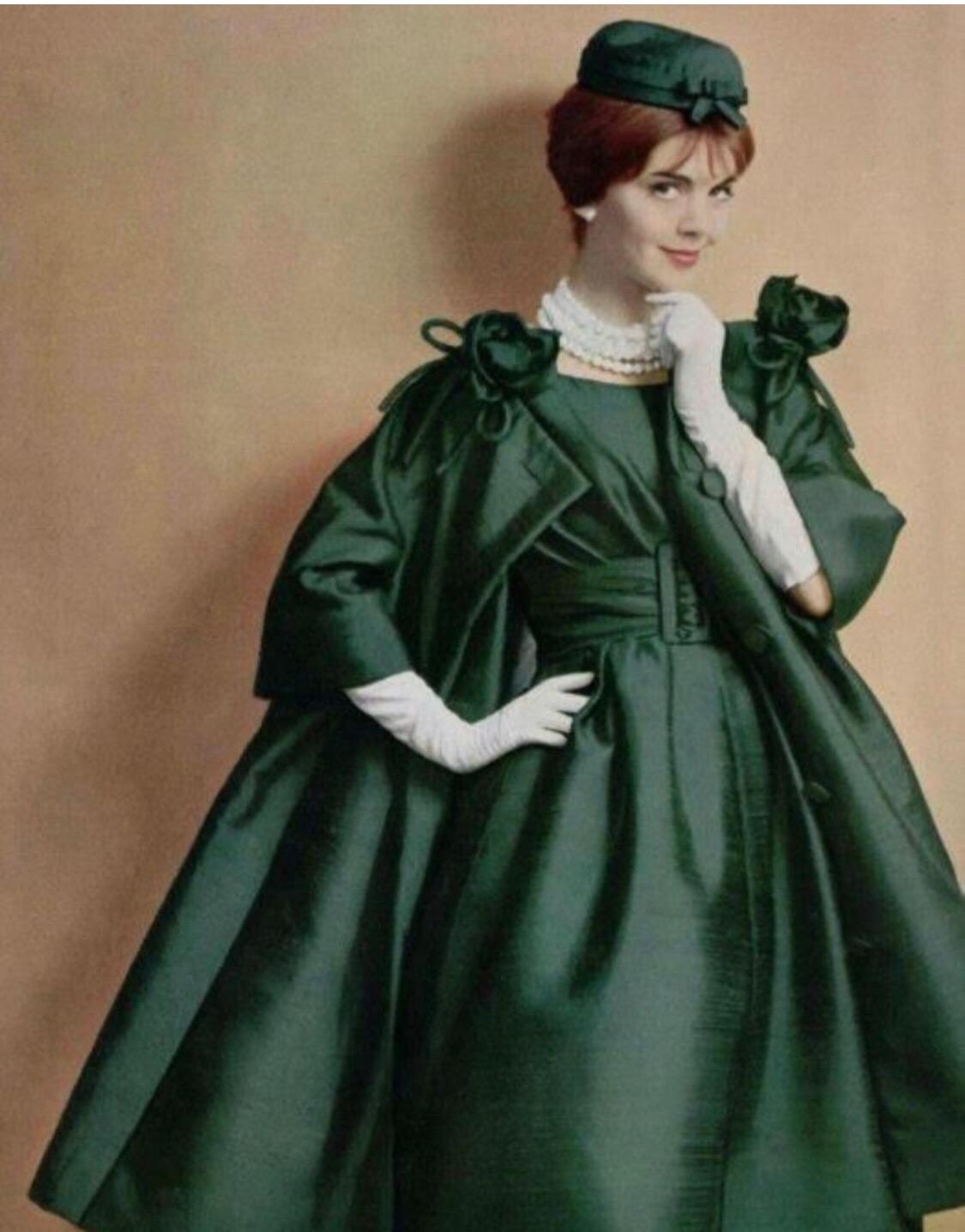 Christian Dior Printemps 1959 Numbered Haute Couture Coat by Yves Saint Laurent.
This green coat from Christian Dior Spring Summer 1959 was designed by Yves Saint Laurent. 
Yves Saint Laurent was hired by Dior in 1955 when he was 21 and worked