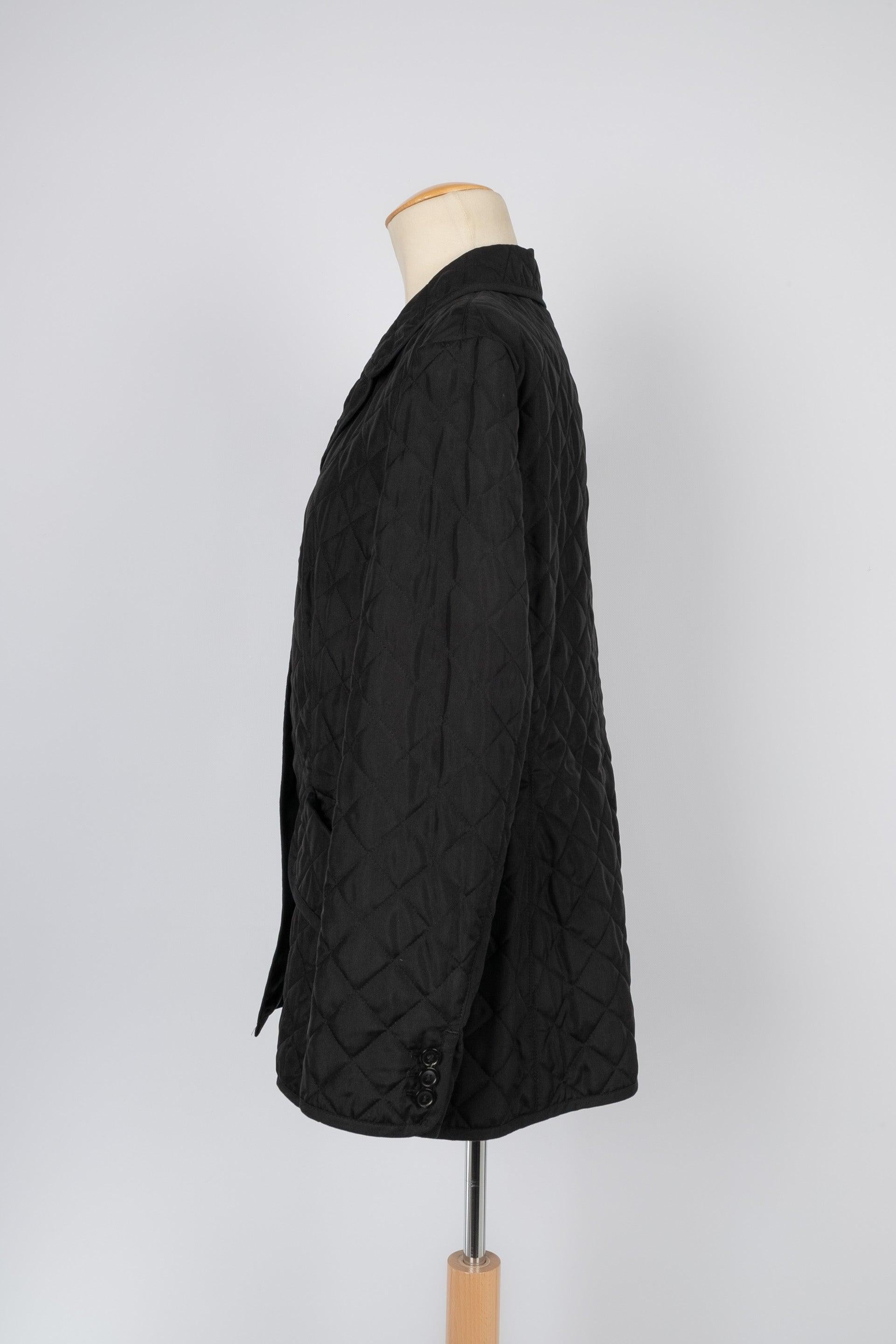 Dior - (Made in Italy) Quilted black silk jacket. 44FR size.

Additional information:
Condition: Very good condition
Dimensions: Shoulder width: 43 cm - Chest: 53 cm - Waist: 45 cm - Sleeve length: 57 cm - Length: 65 cm

Seller Reference: FV65