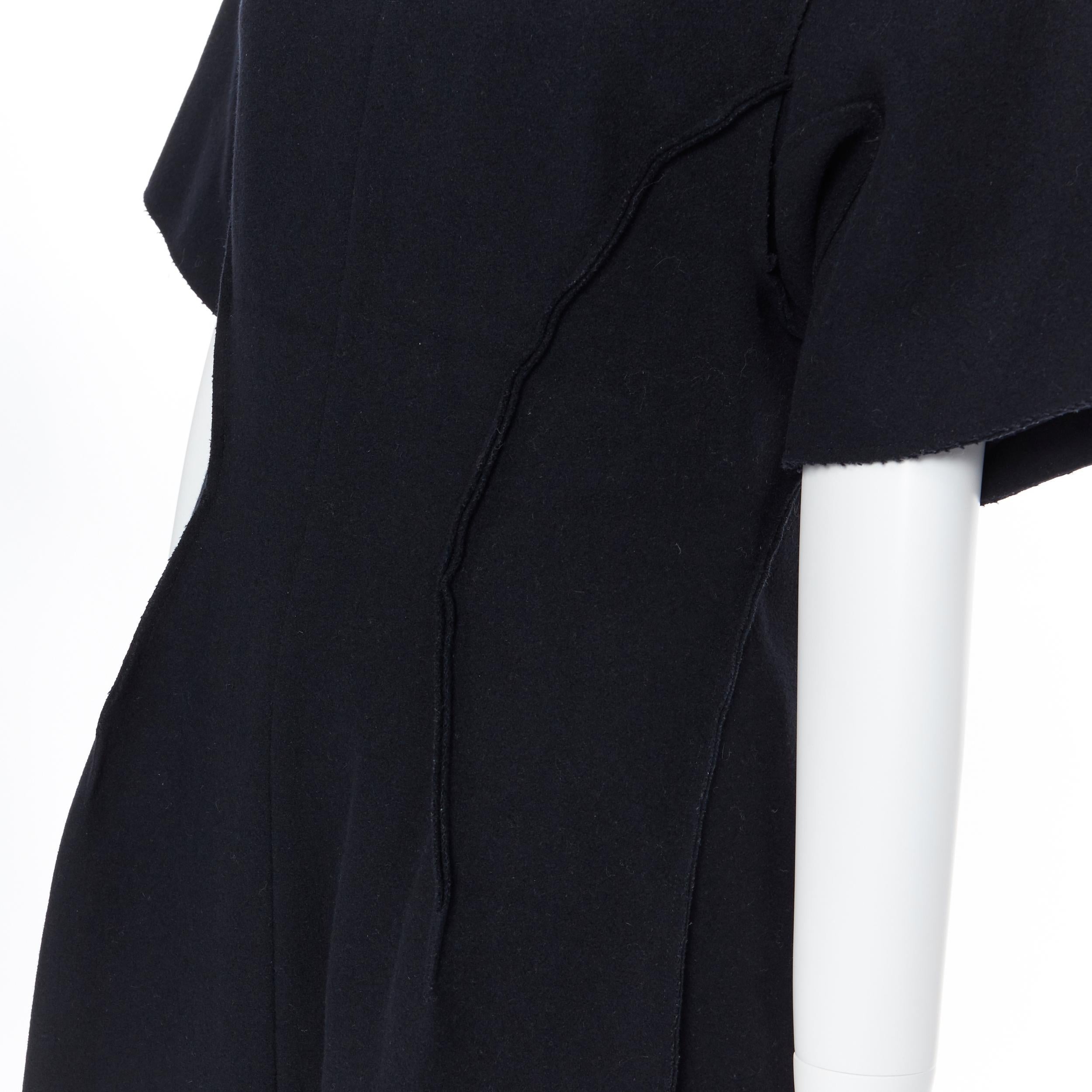 CHRISTIAN DIOR RAF lack wool felt reversed exposed seams flared dress FR42
Brand: Christian Dior
Designer: Raf Simons
Model Name / Style: Flared dress
Material: Wool
Color: Black
Pattern: Solid
Closure: Zip
Extra Detail: Exposed reversed seams