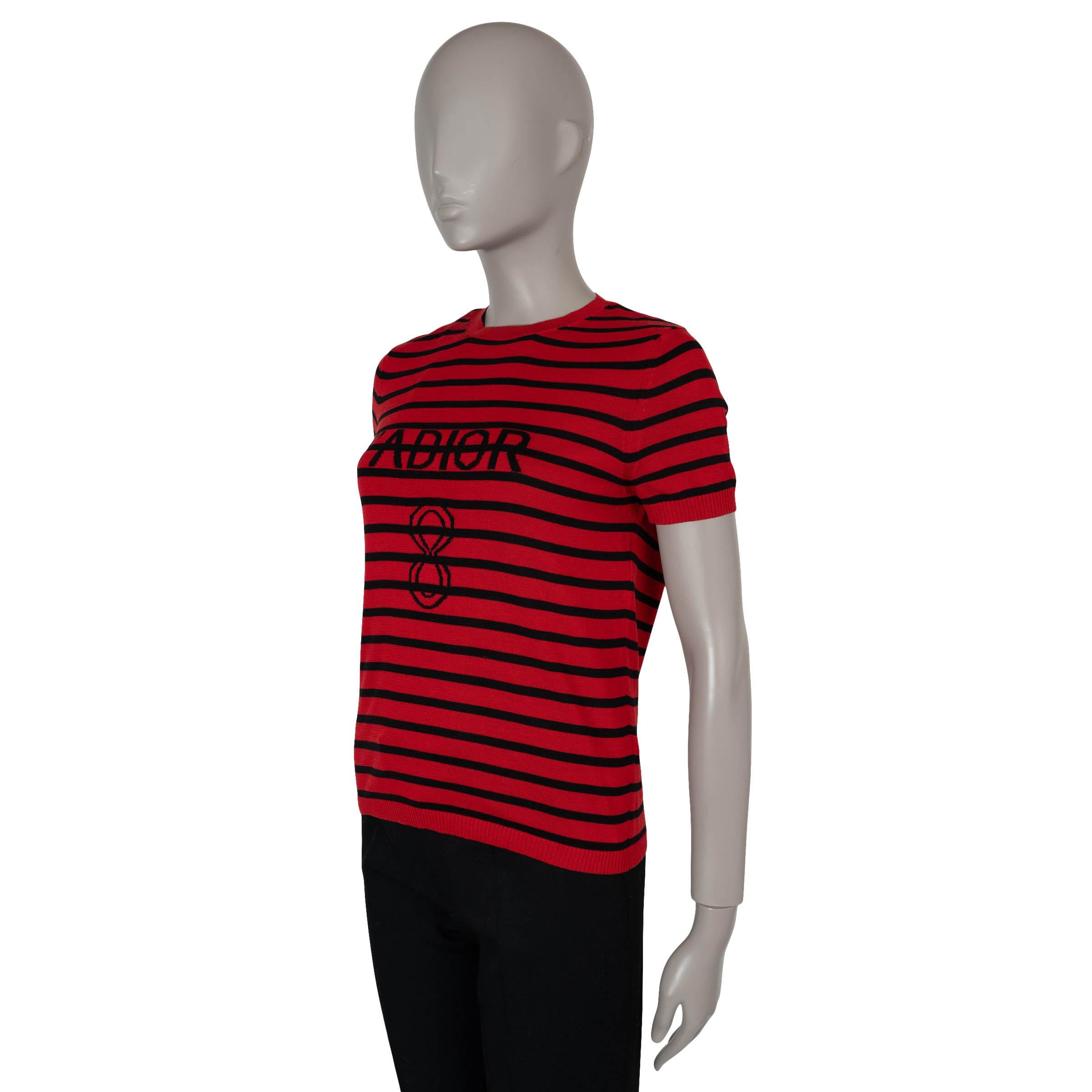 This 100% authentic Christian Dior J'Adior 8 sweater in red silk (59%) and cotton (41%) blends sporty elegance with iconic branding. Designed with black stripes, it features a crewneck, short sleeves, and rib-knit trims. A timeless piece that adds a