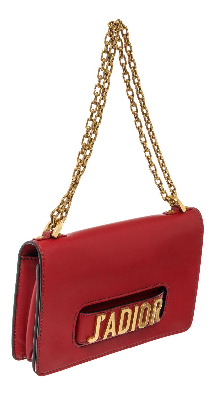 Red smooth Calfskin Christian Dior J'aDior flap bag with gold-tone hardware, chain-link shoulder strap, single handle at front with logo detail, tonal suede and leather lining, four interior pockets and magnetic flap closure at front.

 

67040MSC