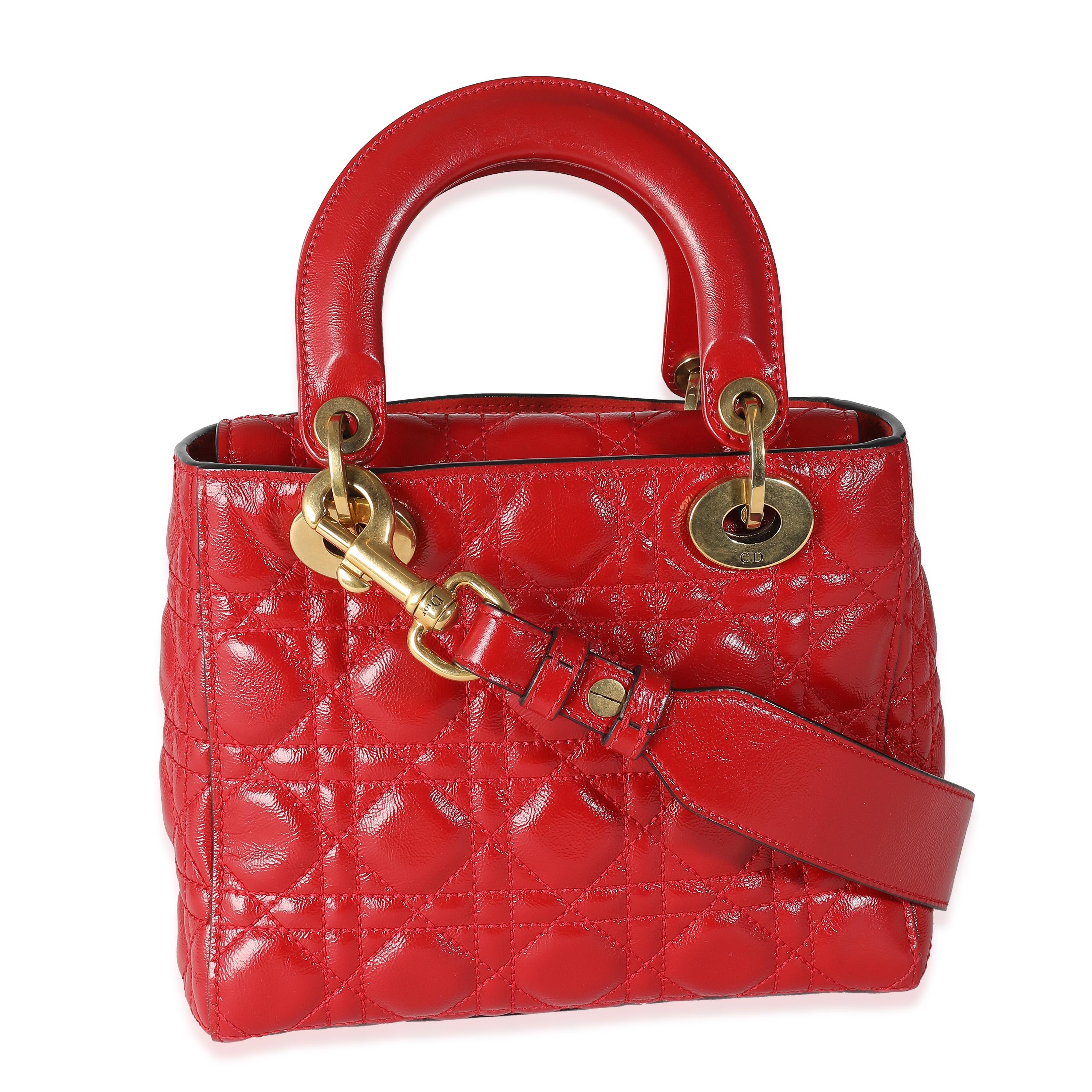 Listing Title: Christian Dior Red Crinkled Patent Cannage Small Lucky Badges My Lady Dior
SKU: 141126
Condition: Pre-owned 
Condition Description: Originally named the 'Chouchou', the Lady Dior bag from Dior was renamed after Princess Diana carried