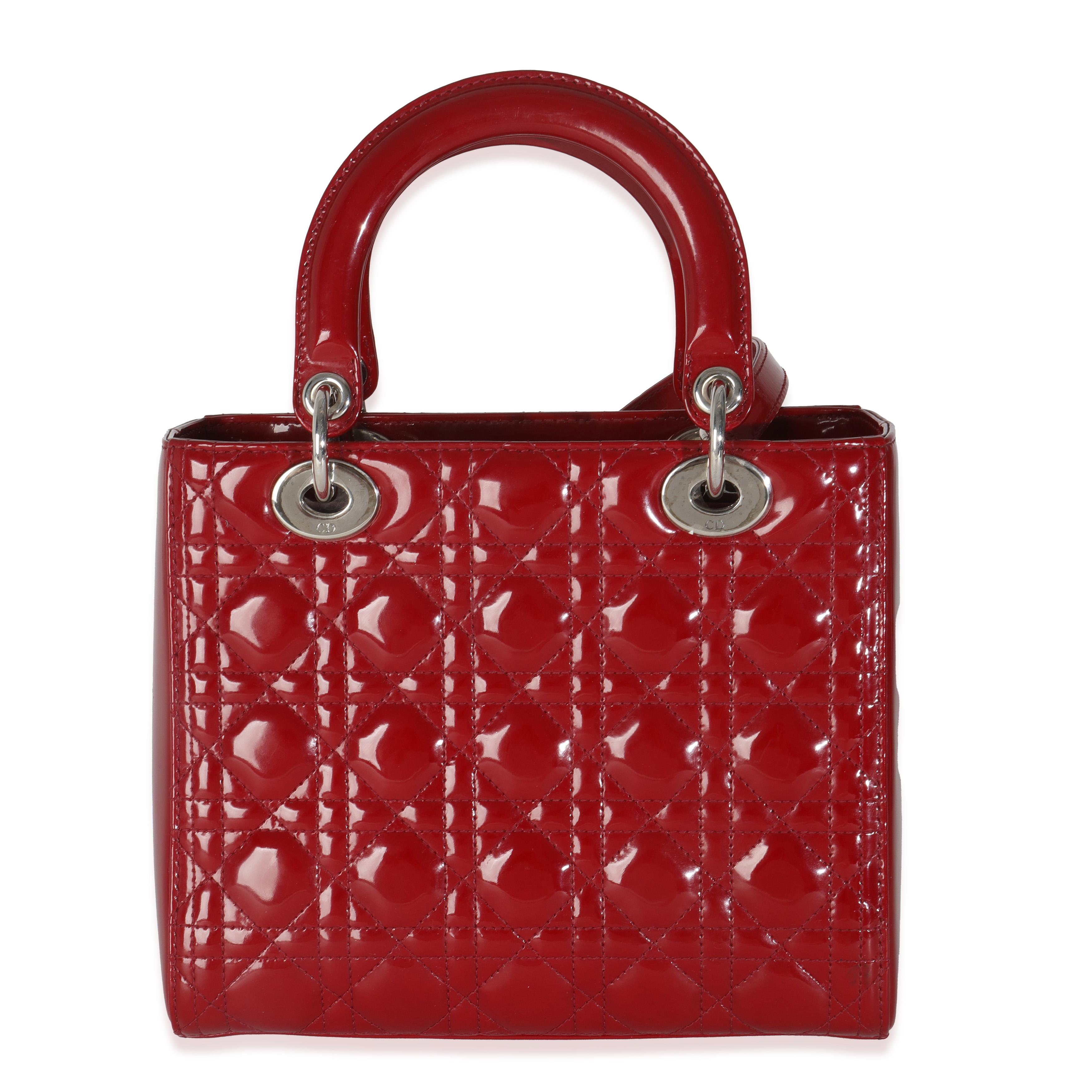 Listing Title: Christian Dior Red Patent Cannage Medium Lady Dior
SKU: 145177
Condition: Pre-owned 
Condition Description: Originally named the 'Chouchou', the Lady Dior bag from Dior was renamed after Princess Diana carried the bag at the Grand