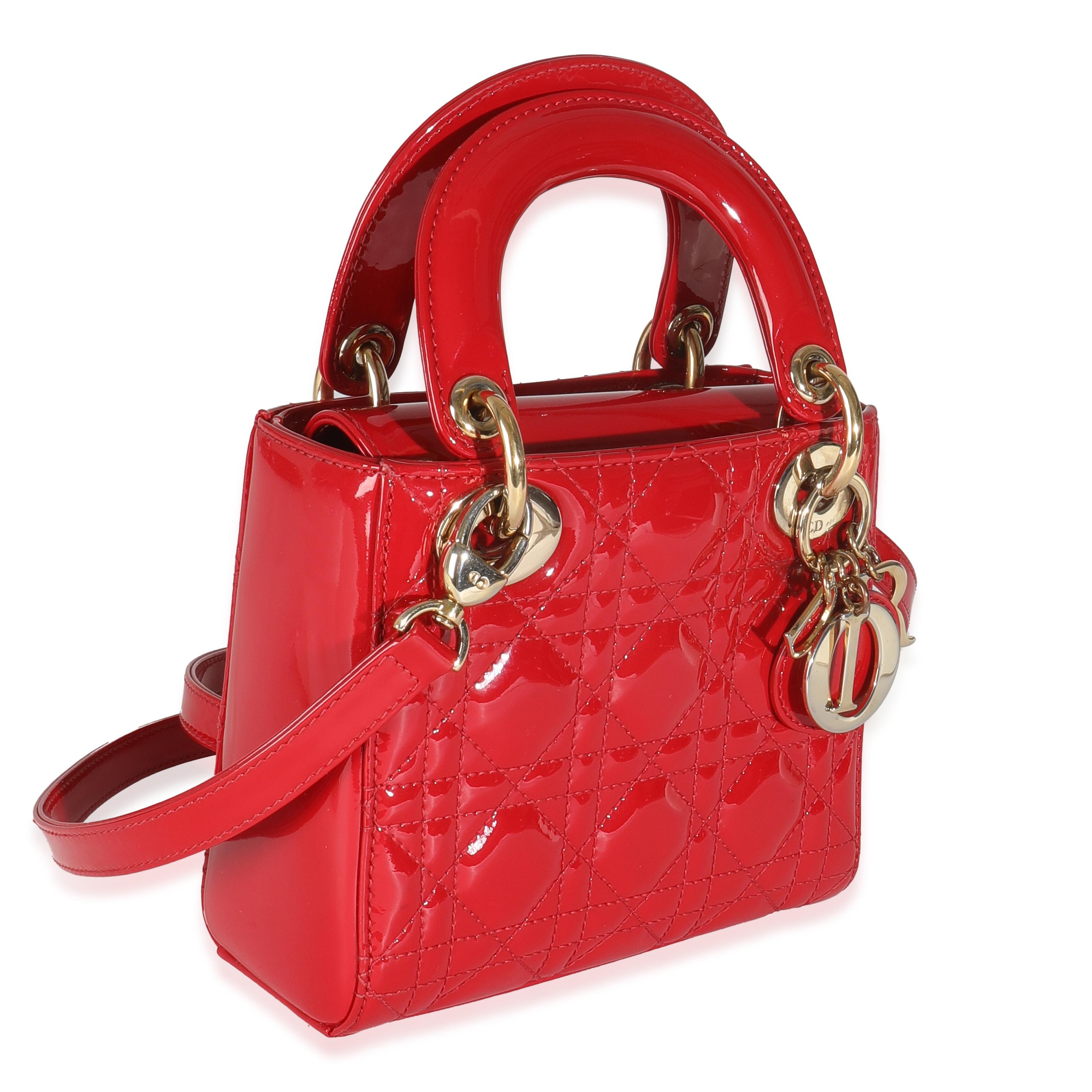 Listing Title: Christian Dior Red Patent Cannage Mini Lady Dior
SKU: 144873
Condition: Pre-owned 
Condition Description: Originally named the 'Chouchou', the Lady Dior bag from Dior was renamed after Princess Diana carried the bag at the Grand