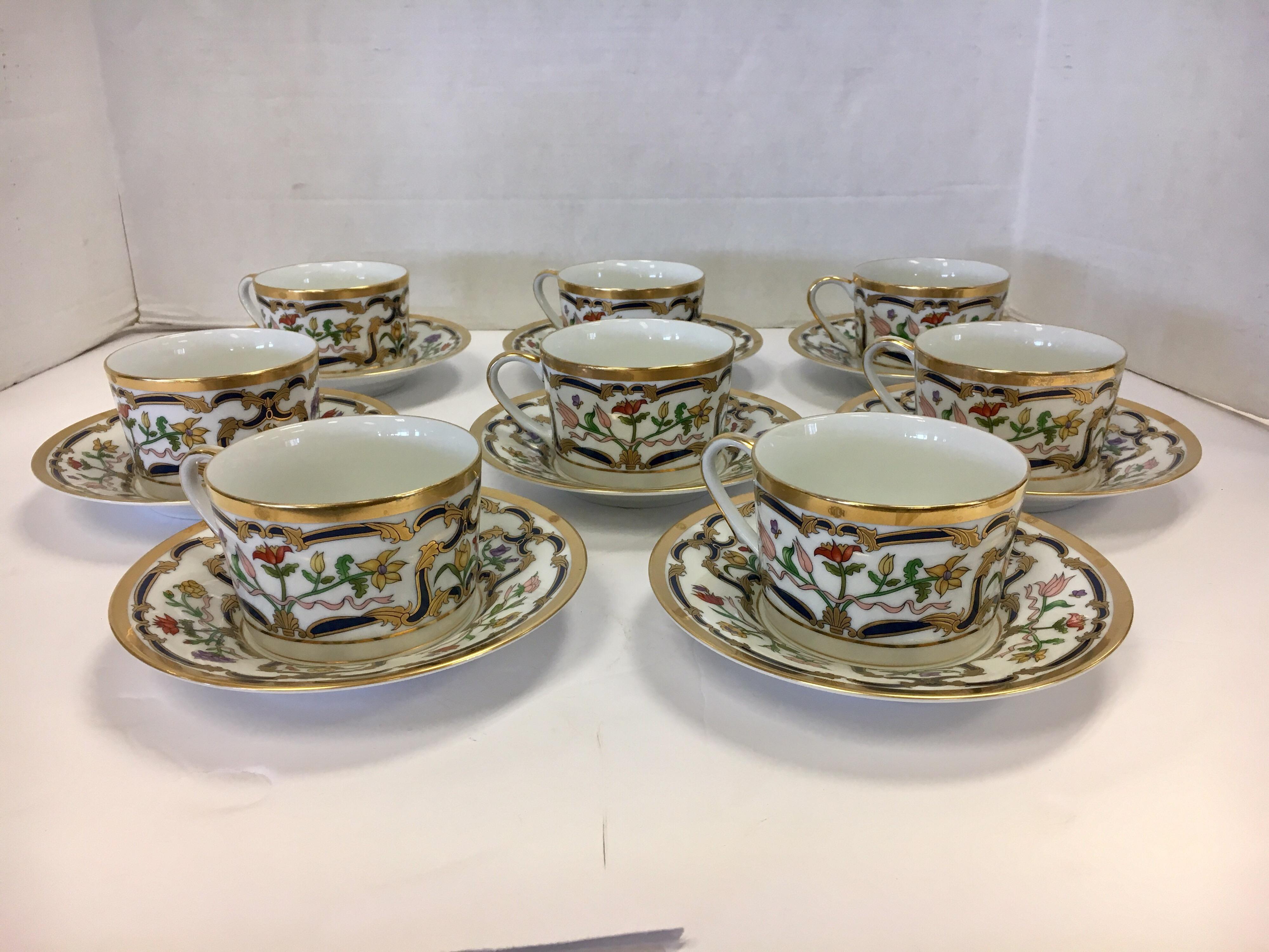 A total of sixteen rare, Christian Dior teacups and saucers, eight of each. The style is Renaissance. The teacups have an opening at the top of 3.5