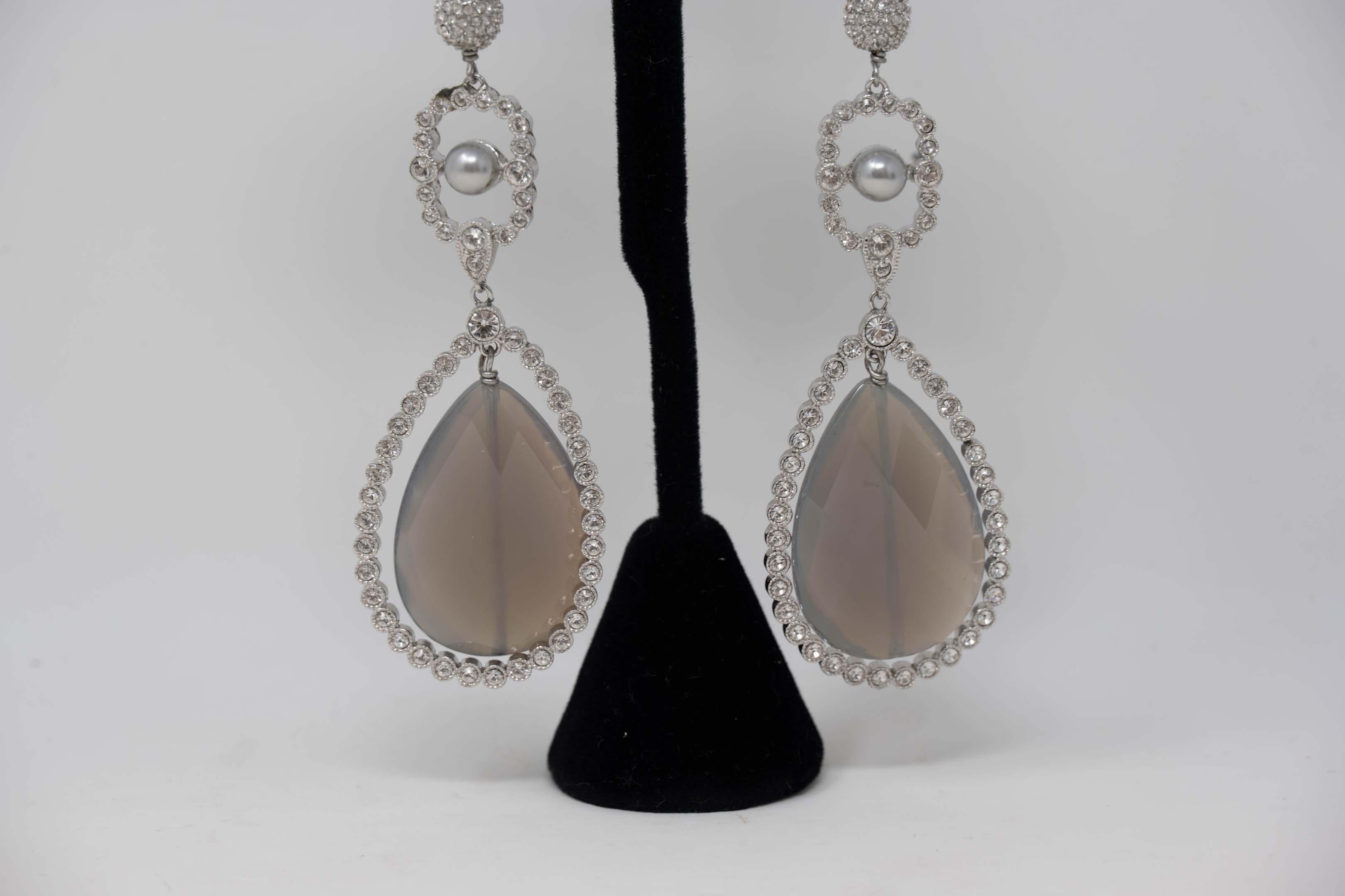 Christian Dior Rhinestones faux pearl and quartz clip-on earrings. Measures 4 inches long, stamped (Dior) on the clasp.
