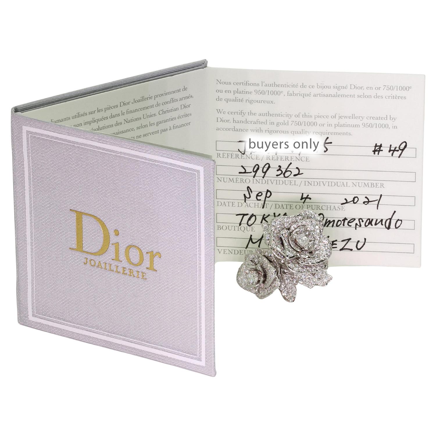 This magnificent Christian Dior ring was designed by Victoire de Castellane and features two rose flowers crafted in 18k white gold set and with round brilliant F-G VVS1-VVS2 diamonds weighing an estimated 3.87 carats. The Rose Dior Bagatelle