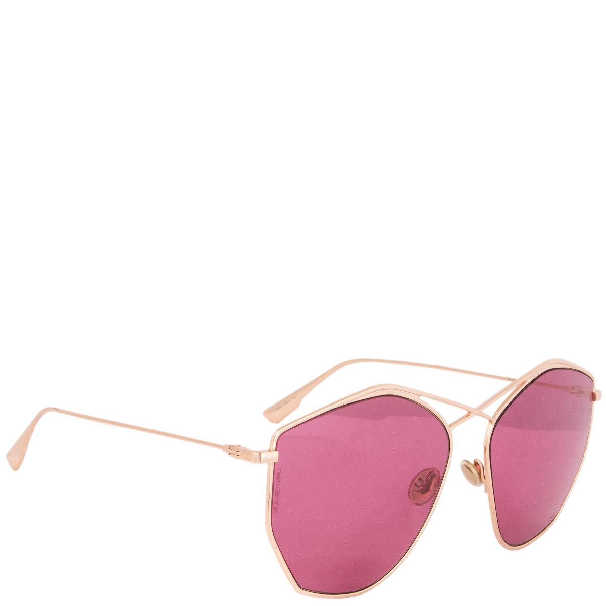 100% authentic Christian Dior 'Stellaire 4' sunglasses with rose gold metal frame and pink lenses. Have been worn and are in excellent condition. Come with case.

Model	DDBU1 59-16 145
Width	13.5cm (5.3in)
Height	5.5cm (2.1in)

All our listings