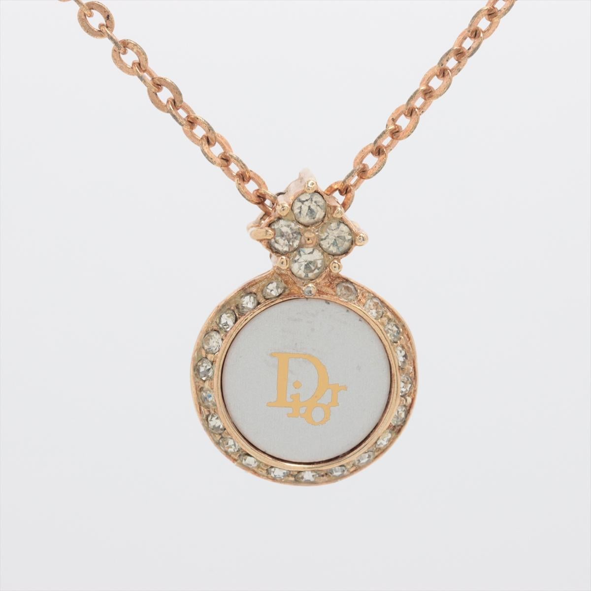 will ship about 4/1


The Christian Dior Round Logo Rhinestone Necklace is an elegant and sophisticated piece that exudes luxury and timeless charm. Featuring a round Dior logo pendant, it is adorned with sparkling rhinestones, with four additional