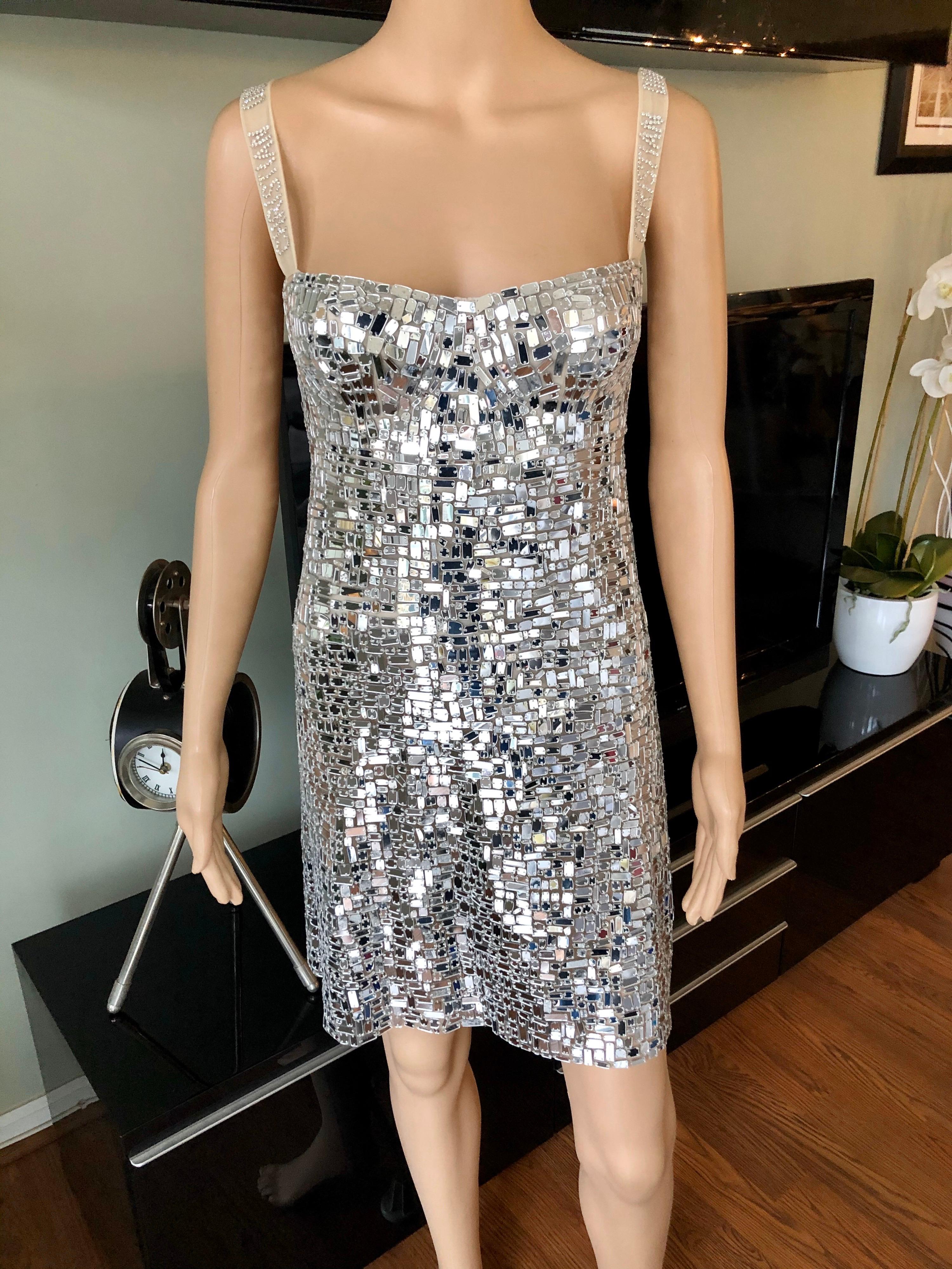 Christian Dior Runway Embellished Silver Mini Dress S

Christian Dior Runway Embellished Logo Silver Mini Dress

Christian Dior mini dress featuring rhinestone embellishments throughout and mesh accent crystal logo embellished straps. Please note