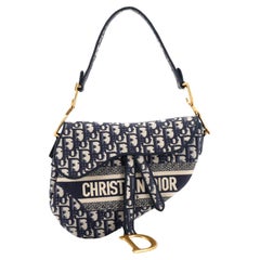Christian Dior Sattelhandtasche Logo besticktes schräg geschnittenes Segeltuch Medium