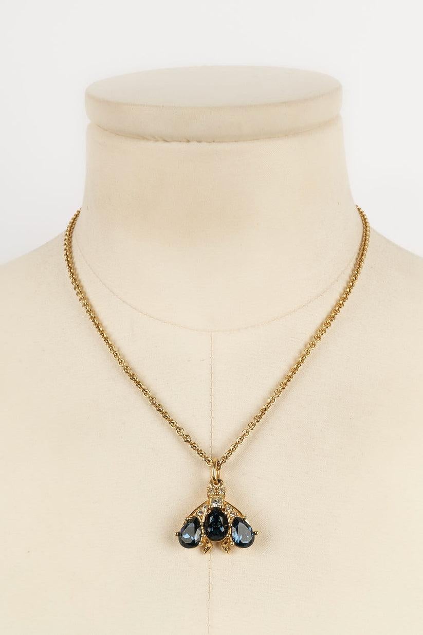 Christian Dior - Ensemble collier et boucles d'oreilles en métal doré et strass bleus Bon état - En vente à SAINT-OUEN-SUR-SEINE, FR