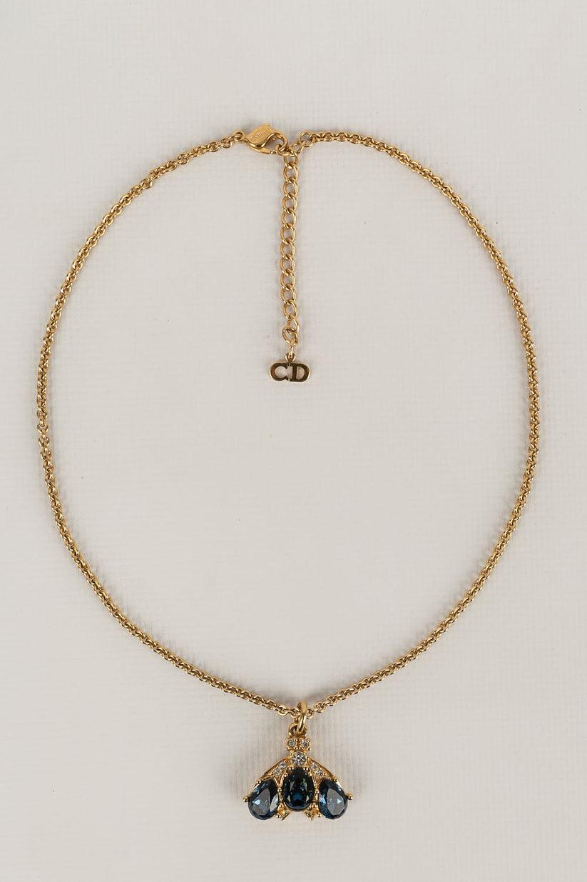 Christian Dior Set aus Halskette und Ohrringen aus Goldmetall und blauen Strasssteinen Damen im Angebot