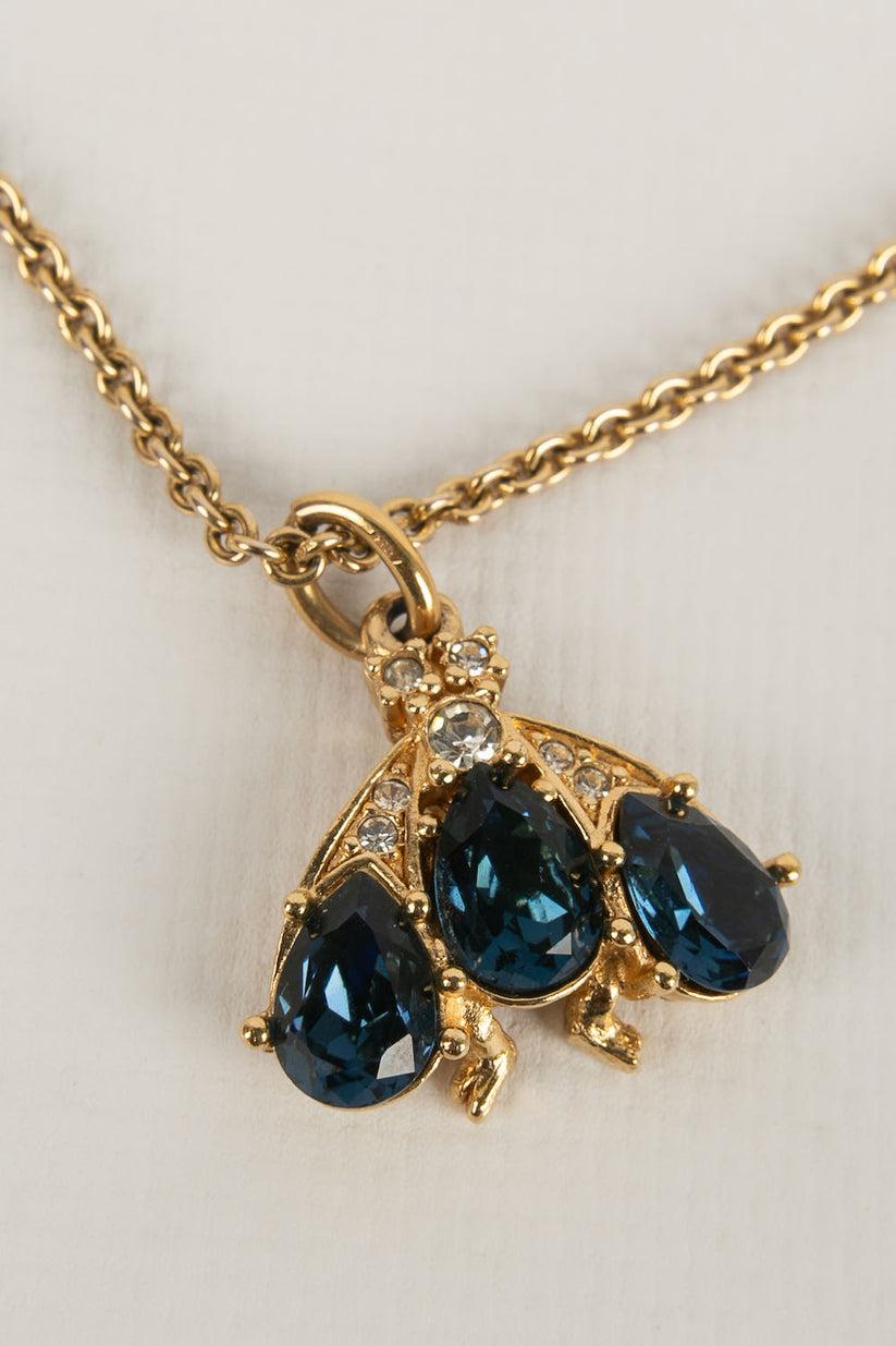 Women's Christian Dior Set of Necklace and Earrings in Gold Metal and Blue Rhinestones For Sale