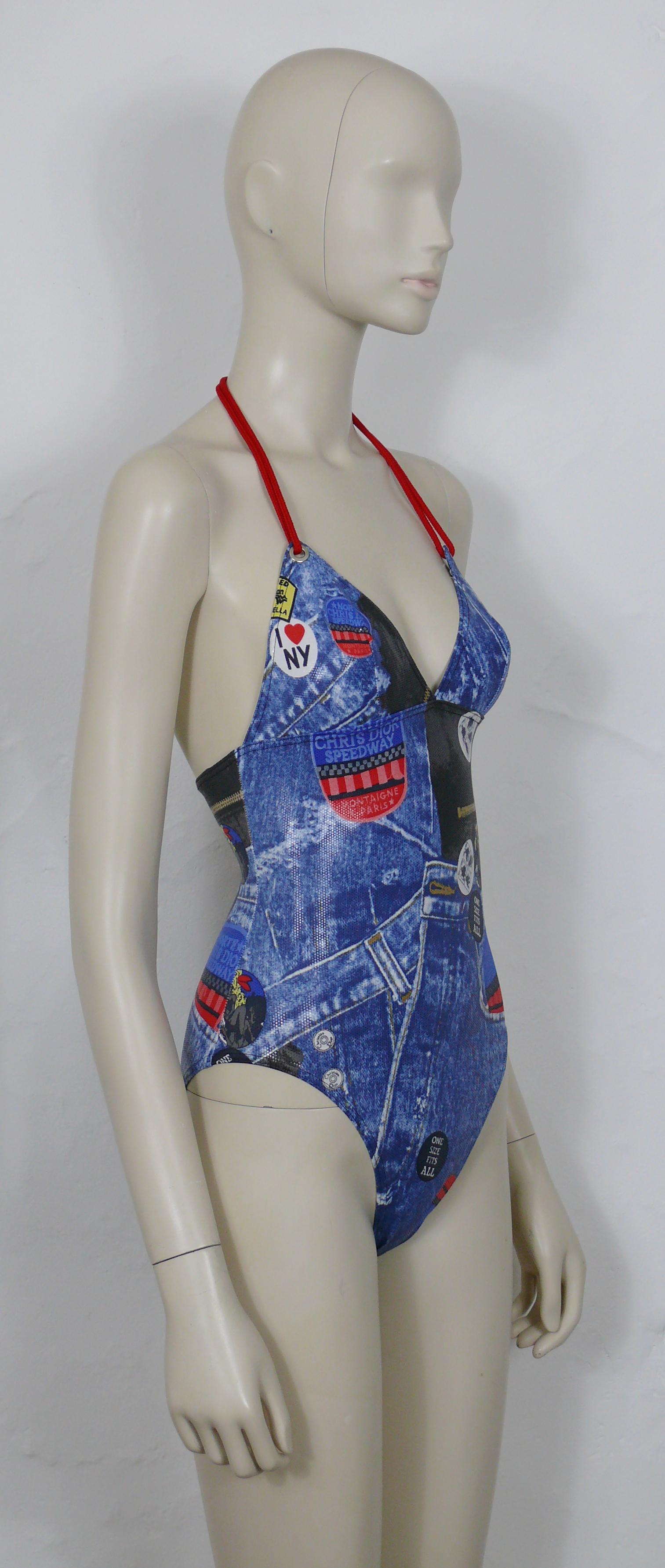 CHRISTIAN DIOR vintage shiny wet look MISS DIORELLA one-piece swimsuit featuring a denim trompe l'oeil print and patches.

Adjustable ties at neck red ropes.

Label reads CHRISTIAN DIOR.
Made in France.

Size tag reads : FR 38 / EUR 36 / INT