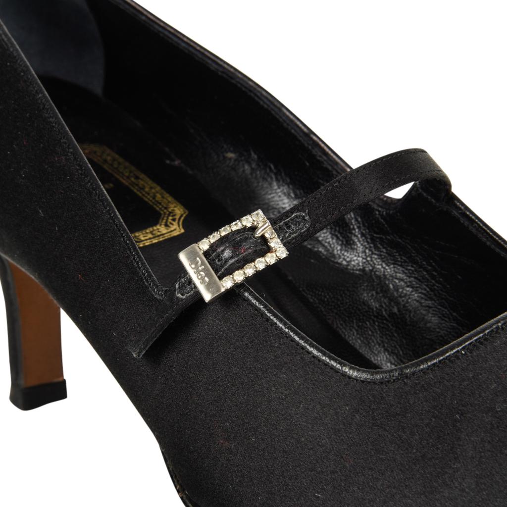 Guaranteed authentic Christian Dior beautiful cut and style define the body of this black satin shoe. 
Mary Jane style strap across with front with a small rectangular diamante buckle.
Beautiful shape of the heel. 
Worn one time only. 
final sale