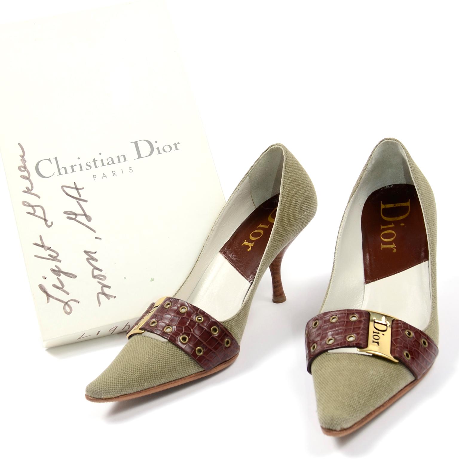 These are fabulous Christian Dior light green textured fabric heels with a brown crocodile embossed leather strap with branded Dior on the buckle. The stacked wood heels of these shoes are gently contoured for a very comfortable fit. These shoes