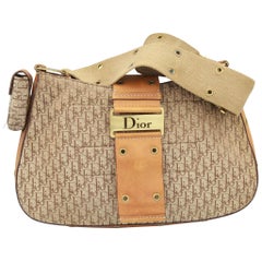 Christian Dior Shoulder Bag in Monogram canvas and brown leather