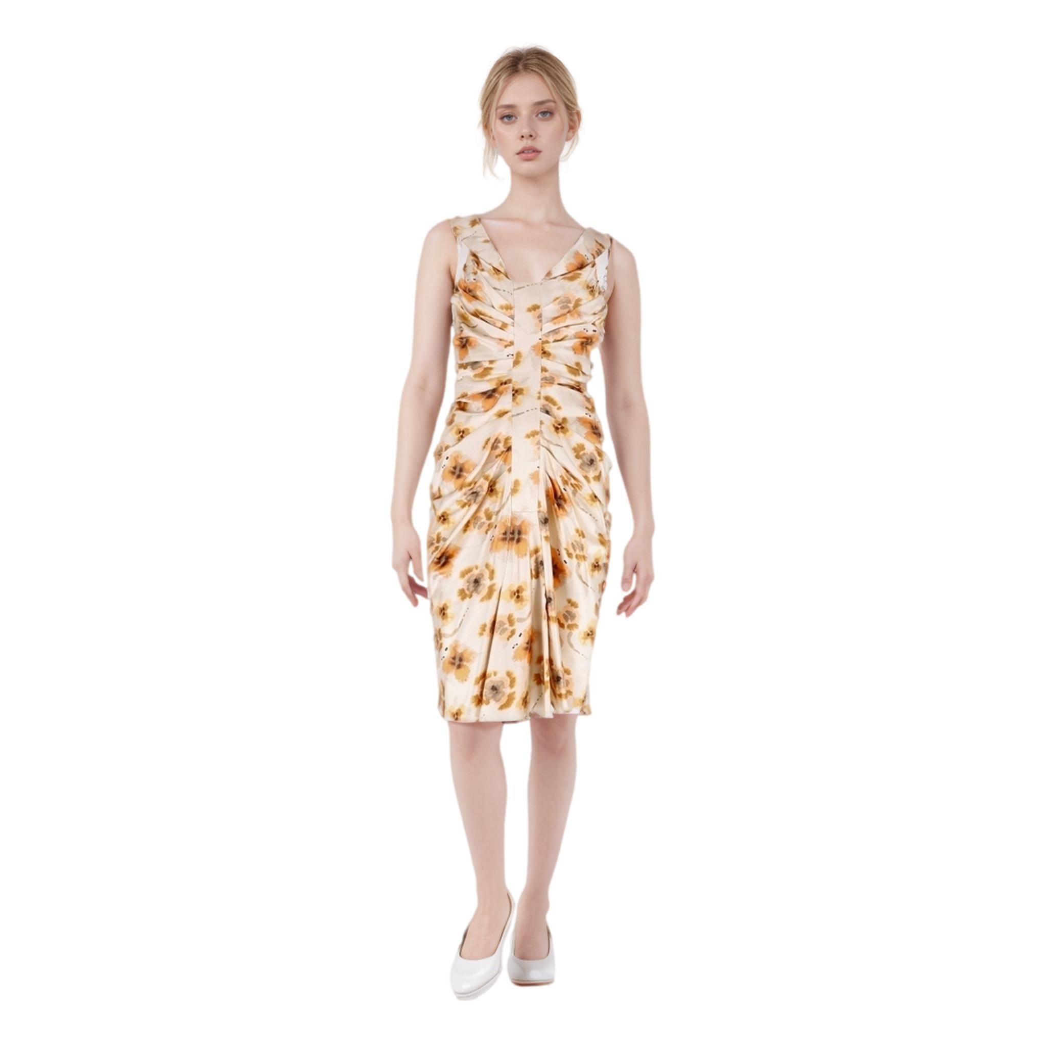 Christian Dior Silk & Cotton Blend Gathered Floral Dress

Beige knee-length dress with all-over yellow tone floral prints.

Detailed with decorative gathering to the centre and V-Neck.

Featuring sleeveless design and zip fastening to rear, lined