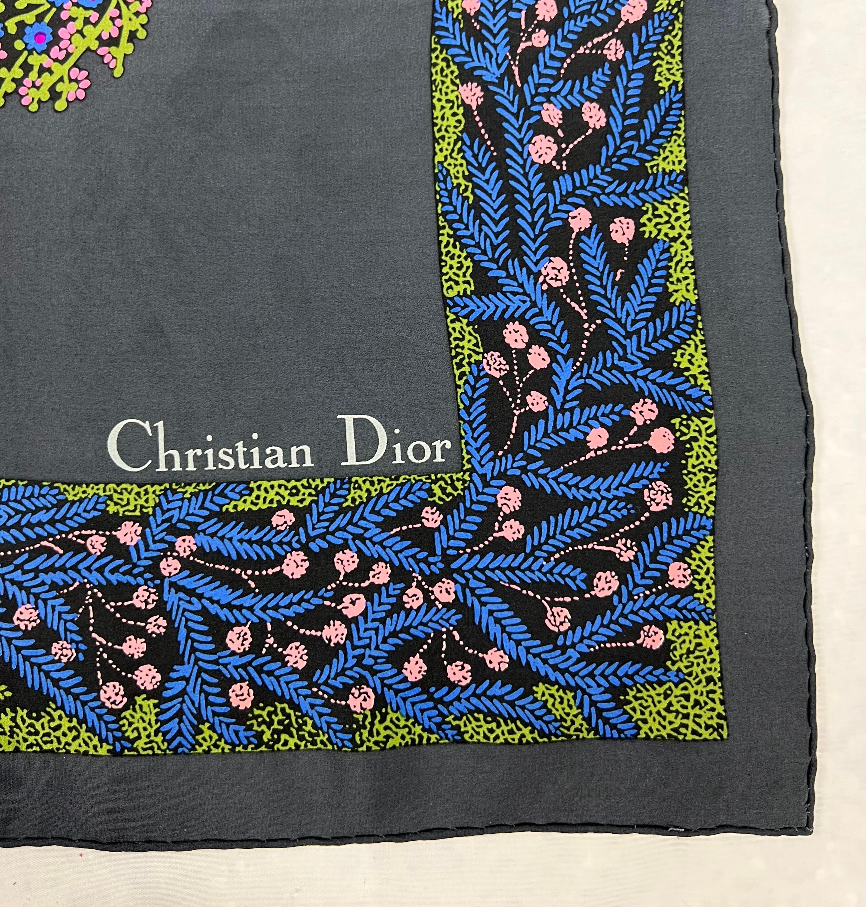 Product details:

The scarf features bright multicolored floral and animal print.