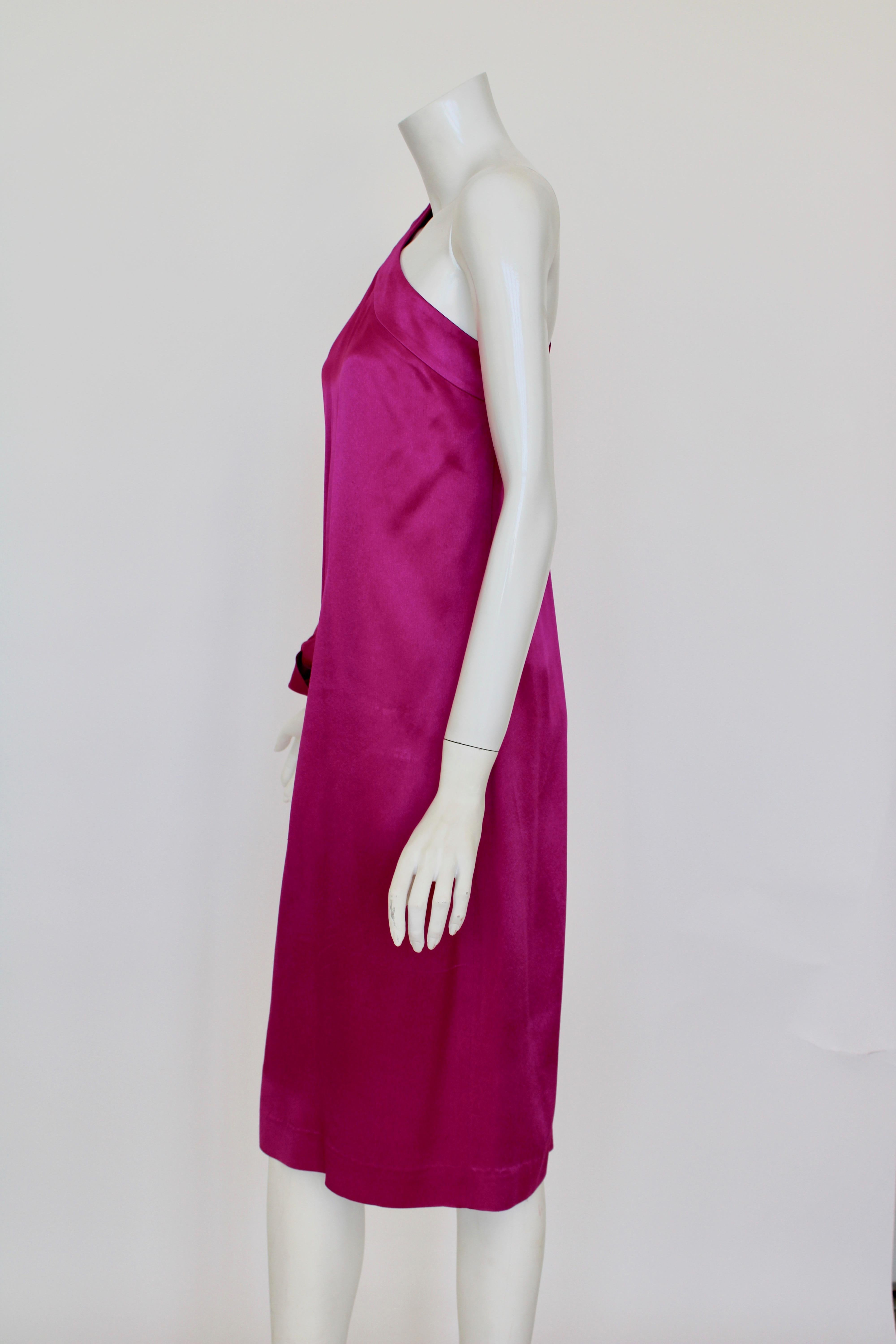 One shouldered silk cocktail dress, dolman sleeve with tie at the wrist. Beautiful fuchsia color. 