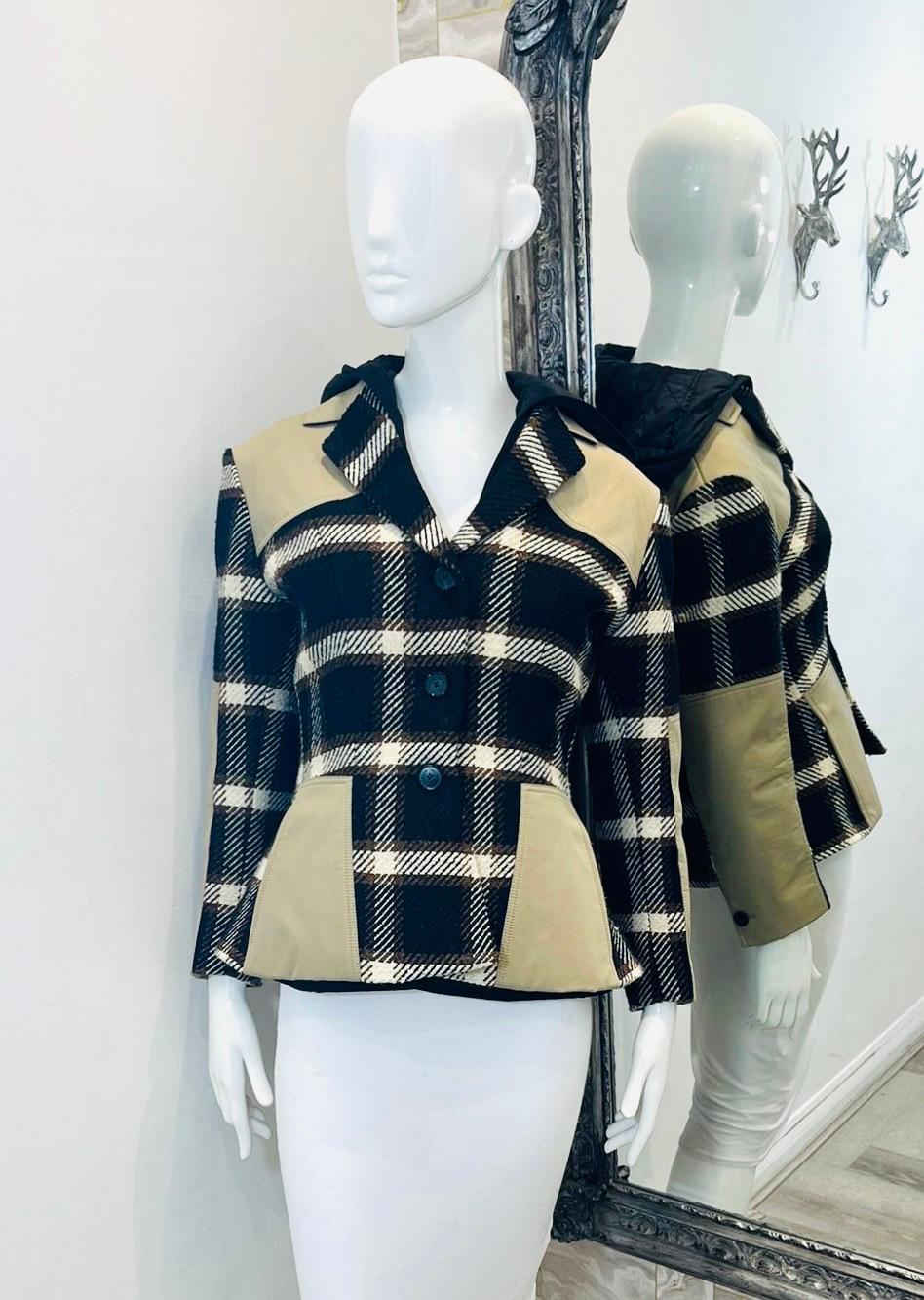 Christian Dior Silk & Wool Plaid Check Hooded Coat

From 2022/23 AW collection - Black coat designed with white and orange detailed plaid check.

Styled with trench coat inspired, beige inserts to the shoulders, pockets and front.

Featuring black