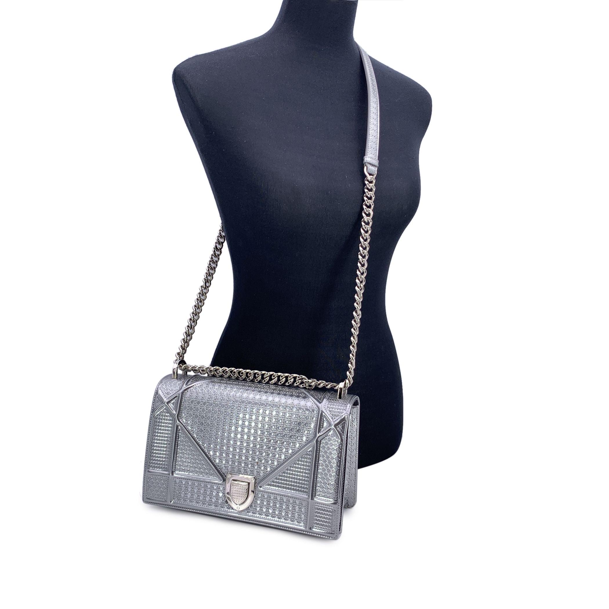 This beautiful Bag will come with a Certificate of Authenticity provided by Entrupy. The certificate will be provided at no further cost. Introducing the Dior Diorama in Silver, a stunning shoulder bag that radiates luxury and sophistication.