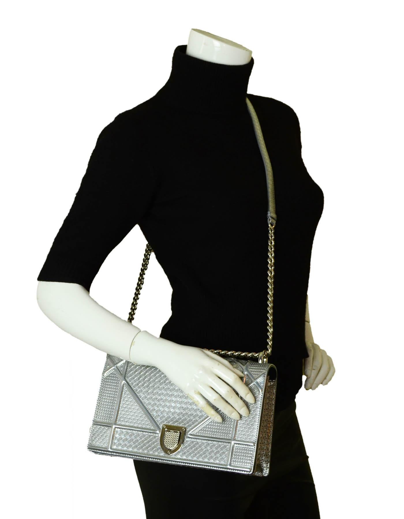 Christian Dior Silver Metallic Micro-Cannage Medium Diorama Flap Bag

Made In: Italy
Year of Production: 2015
Color: Silver
Hardware: Silvertone
Materials: Glazed leather and metal
Lining: Dark grey smooth leather
Closure/Opening: Flap top with