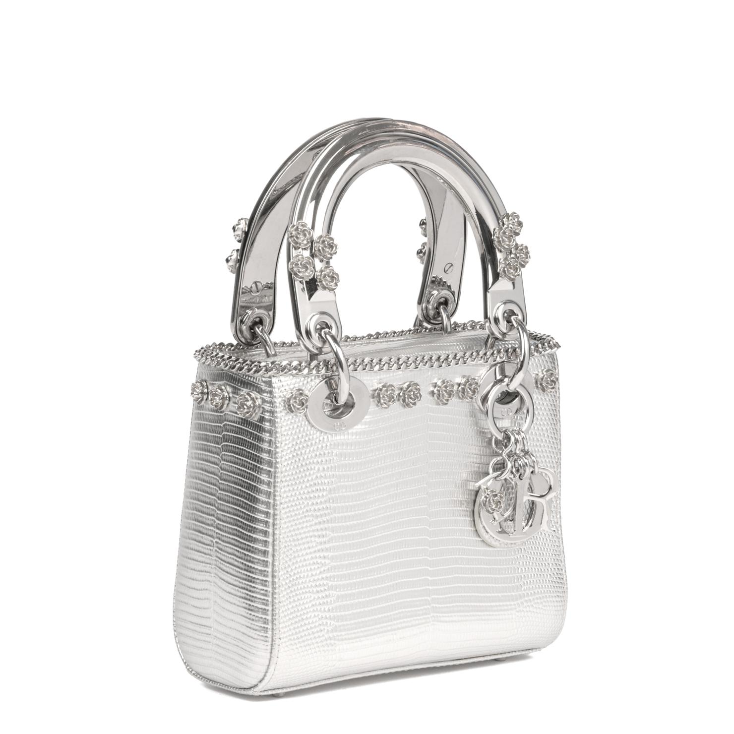 CHRISTIAN DIOR
Silver Lizard Leather, Flower Studded Mini Lady Dior 

Xupes Reference: CB891
Serial Number: 16-BO-1100
Age (Circa): 2010
Accompanied By: Christian Dior Dust Bag, Shoulder Strap
Authenticity Details: Date Stamp (Made in Italy)
Gender: