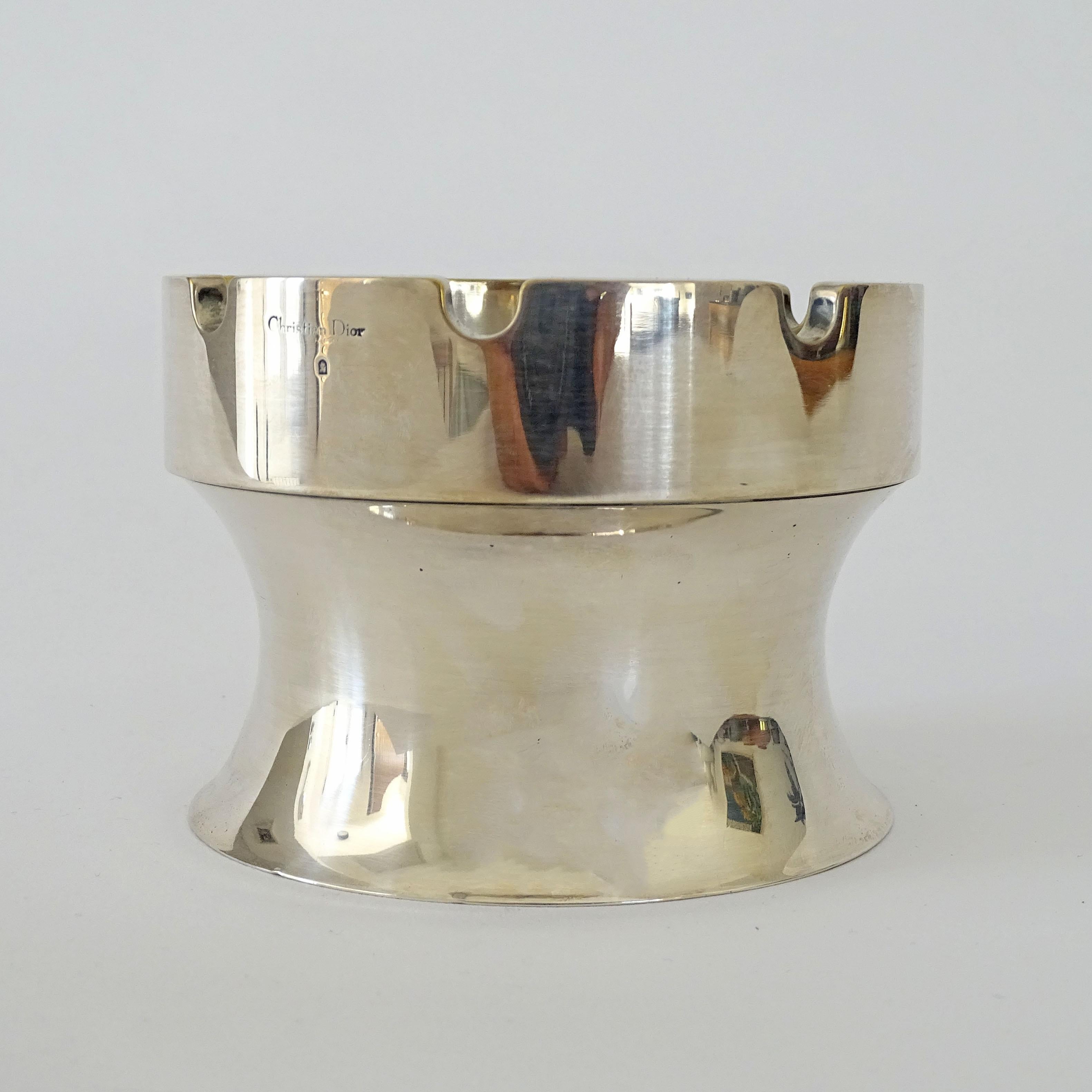 Christian Dior silver metal 
Chess rook shaped Ashtray, France 1960s
Fully marked Christian Dior.