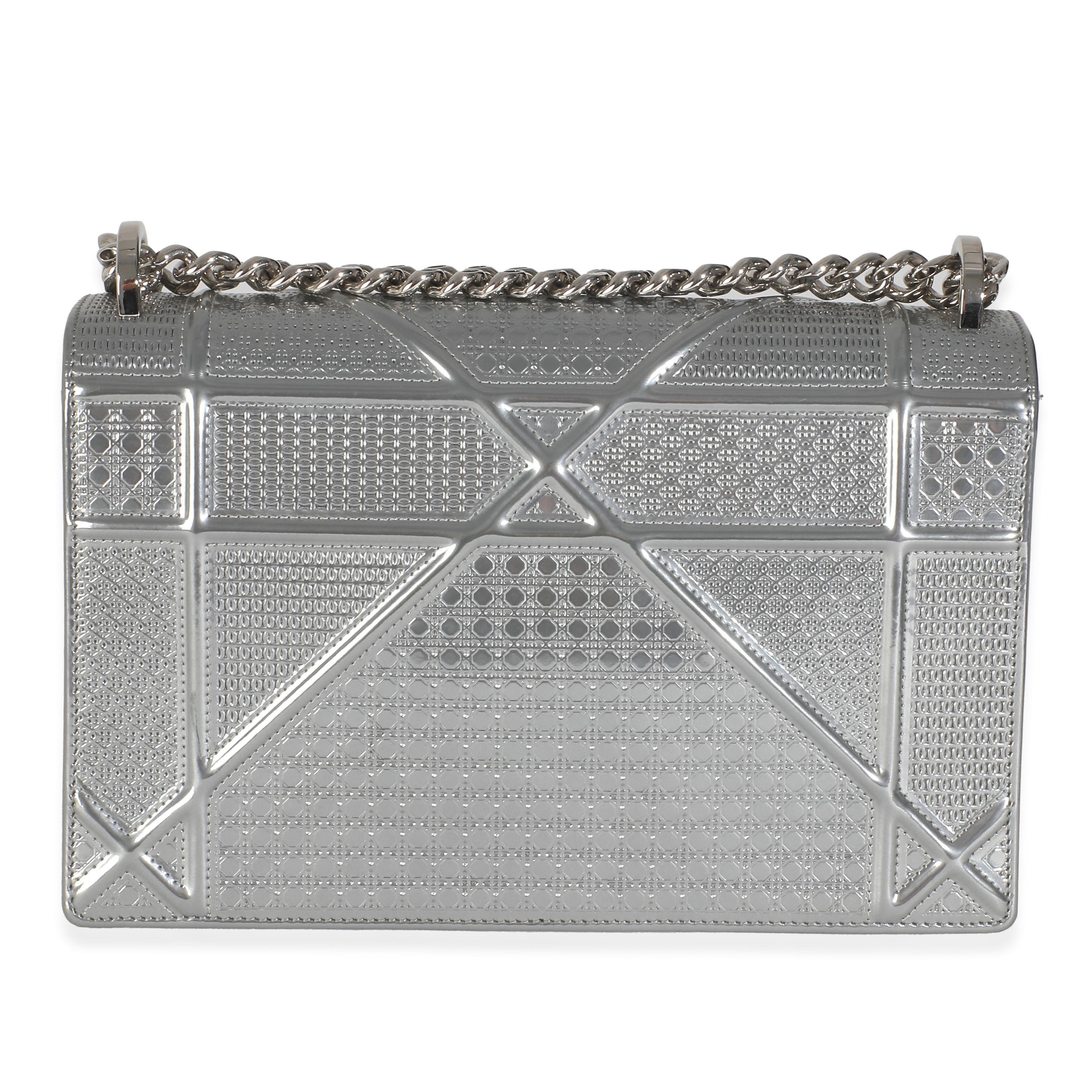 Listing Title: Christian Dior Silver Metallic Micro Cannage Patent Medium Diorama Flap Bag
SKU: 146158
Condition: Pre-owned 
Handbag Condition: Excellent
Condition Comments: Item is in excellent condition and displays light signs of wear. Faint