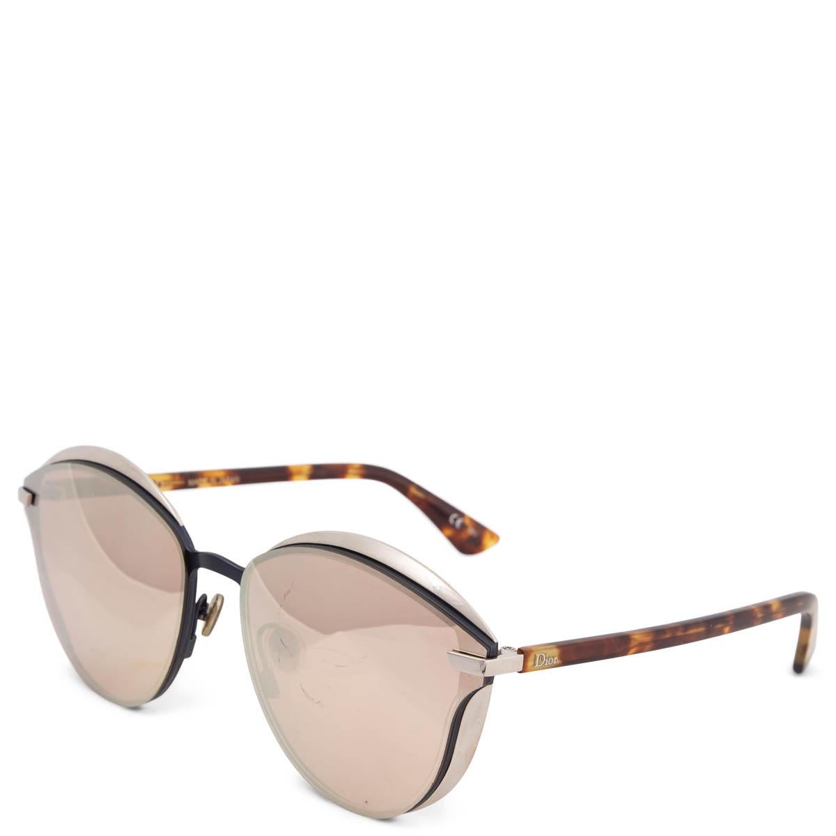 100% authentic Christian Dior Murmure Edition Limitée sunglasses with grey mirrored lenses, brown tortoise temples and a light gold-tone metal frame. Have been worn and show some scratches on the left lens. Overall in very good condition. Comes with