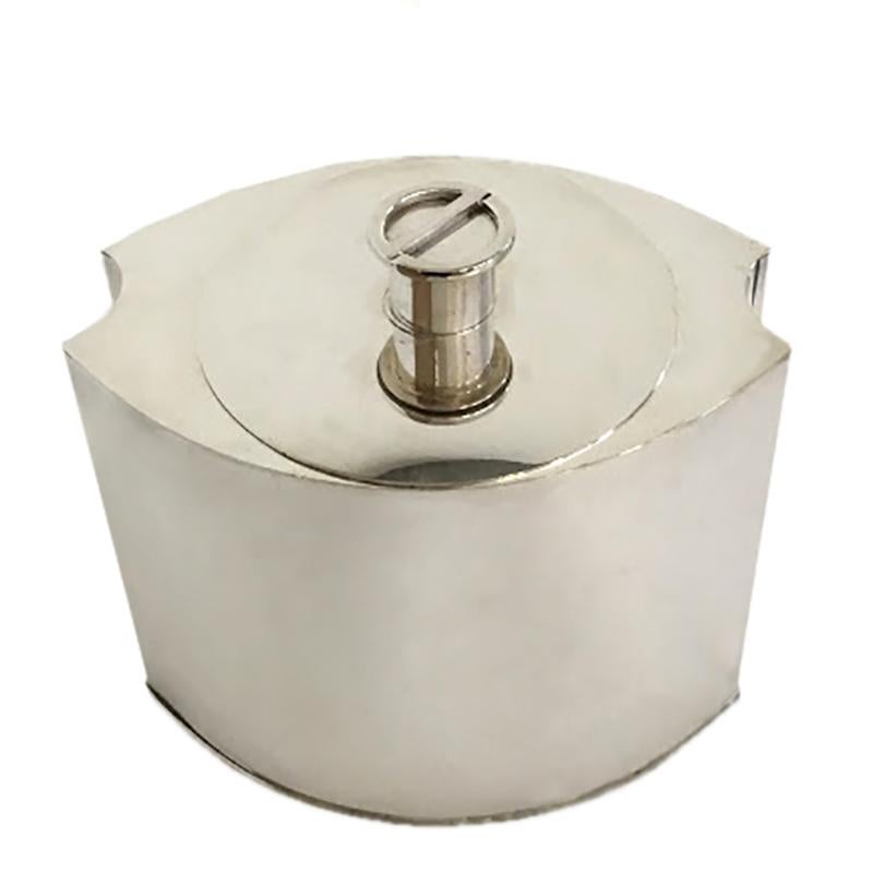This ultra chic ice bucket by Christian Dior features a unique design in silver plate with 