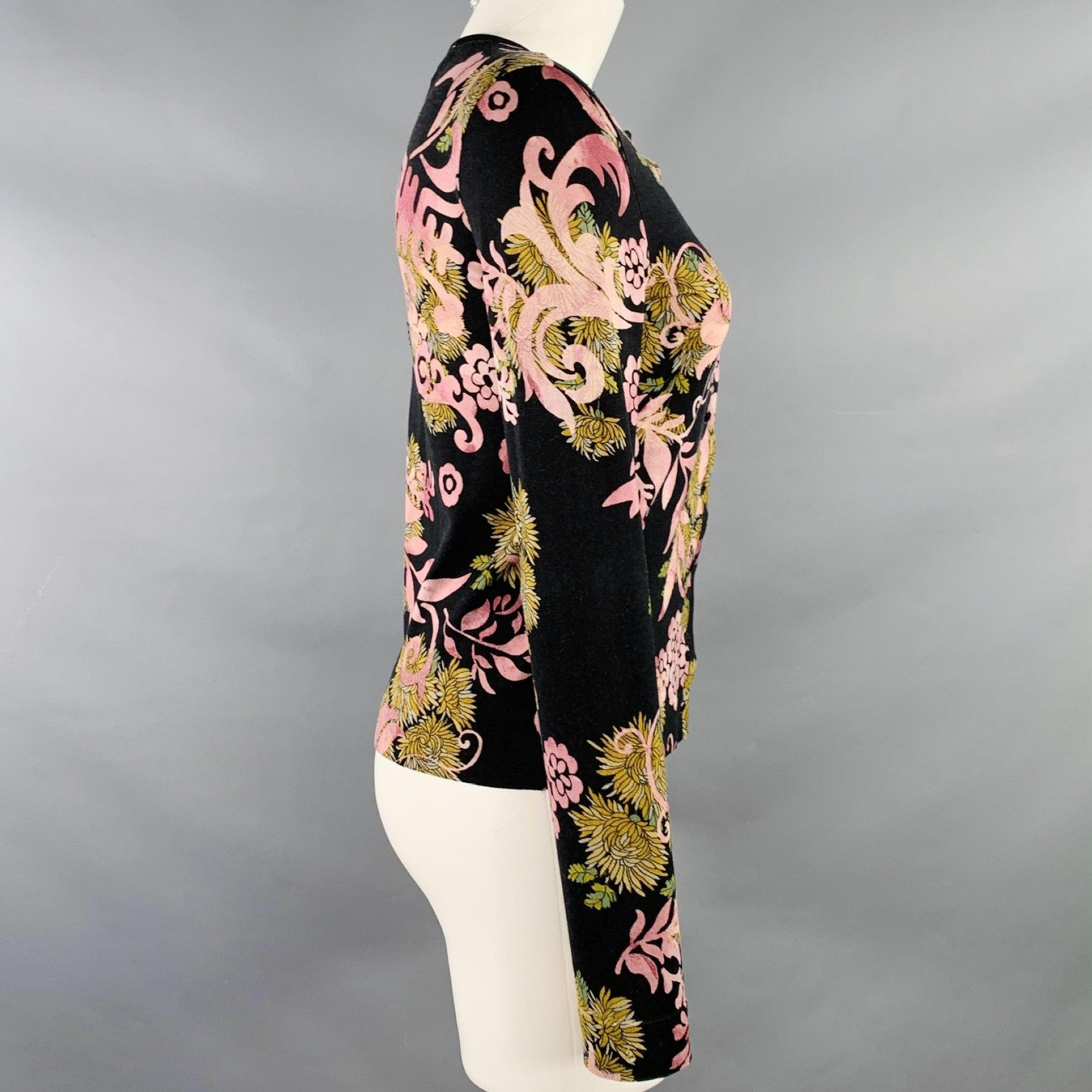 CHRISTIAN DIOR cardigan
in a black and purple wool blend jersey featuring an abstract floral print, long sleeves, and button closure with crew neck. Made in France.Very Good Pre-Owned Condition. Minor signs of wear. 

Marked:   FR 38 

Measurements: