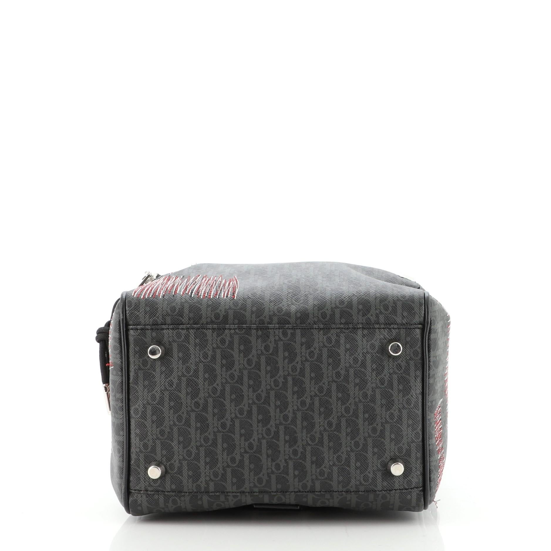 Christian Dior Sling Rucksack aus beschichtetem, dunkellicht beschichtetem Segeltuch im Zustand „Gut“ in NY, NY