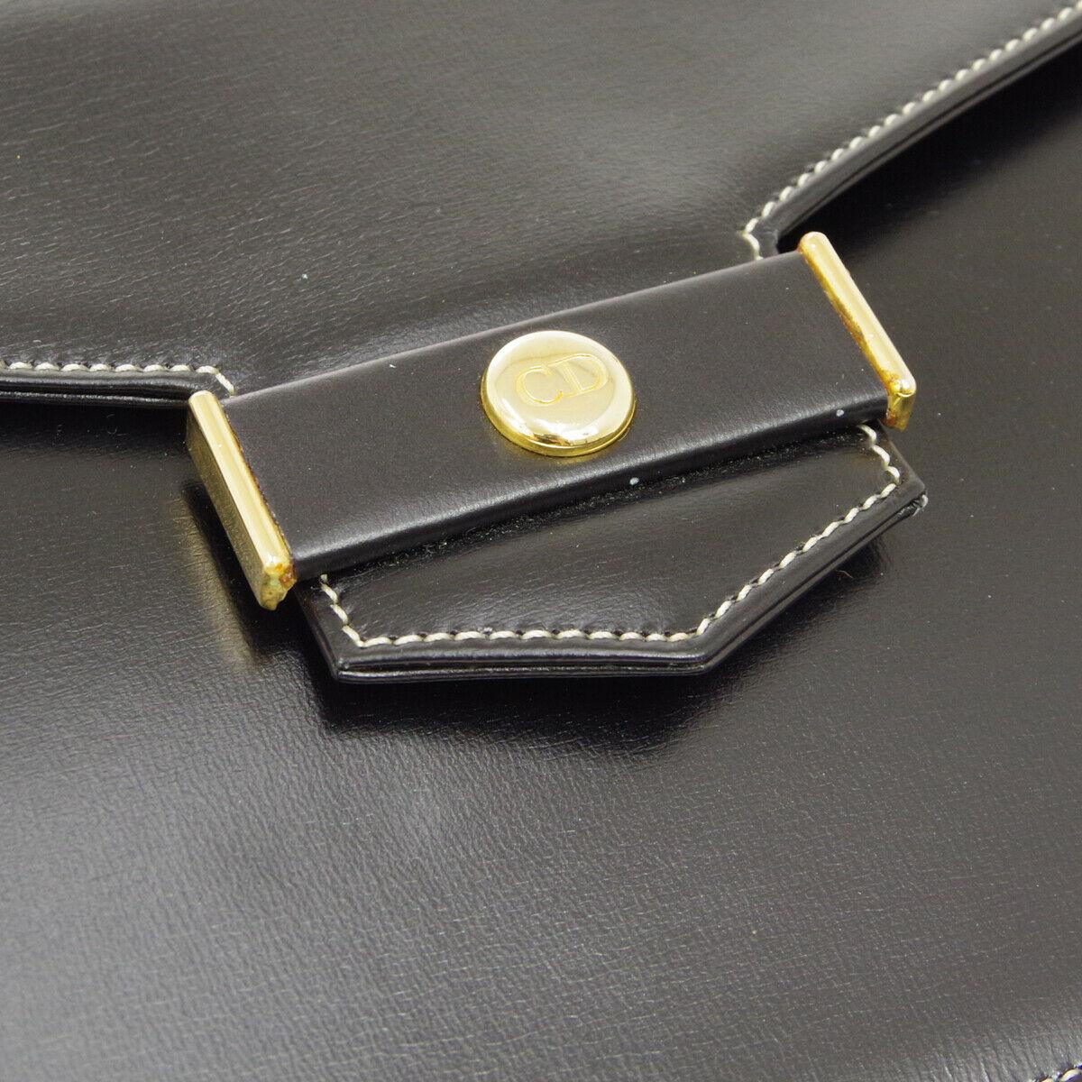 Christian Dior Small Black Leather Gold 2 in 1 Clutch Shoulder Flap Bag

Leather 
Gold tone hardware
Woven lining
Made in France
Shoulder strap drop 11.5