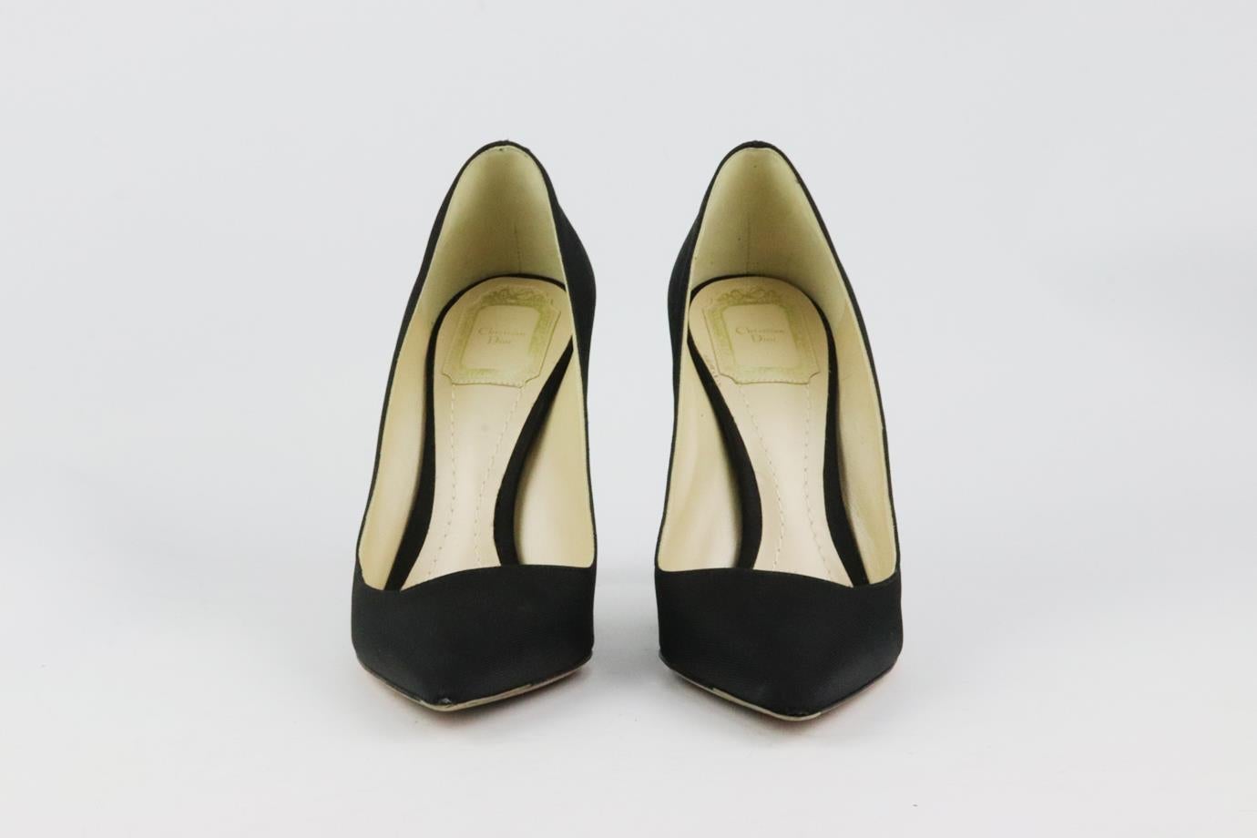 These ‘Songe’ pumps by Christian Dior are a classic style that will never date, made in Italy from black satin, they have sharp pointed toes and striking 89 mm curved perspex heels to take you from morning meetings to dinner with friends. Heel