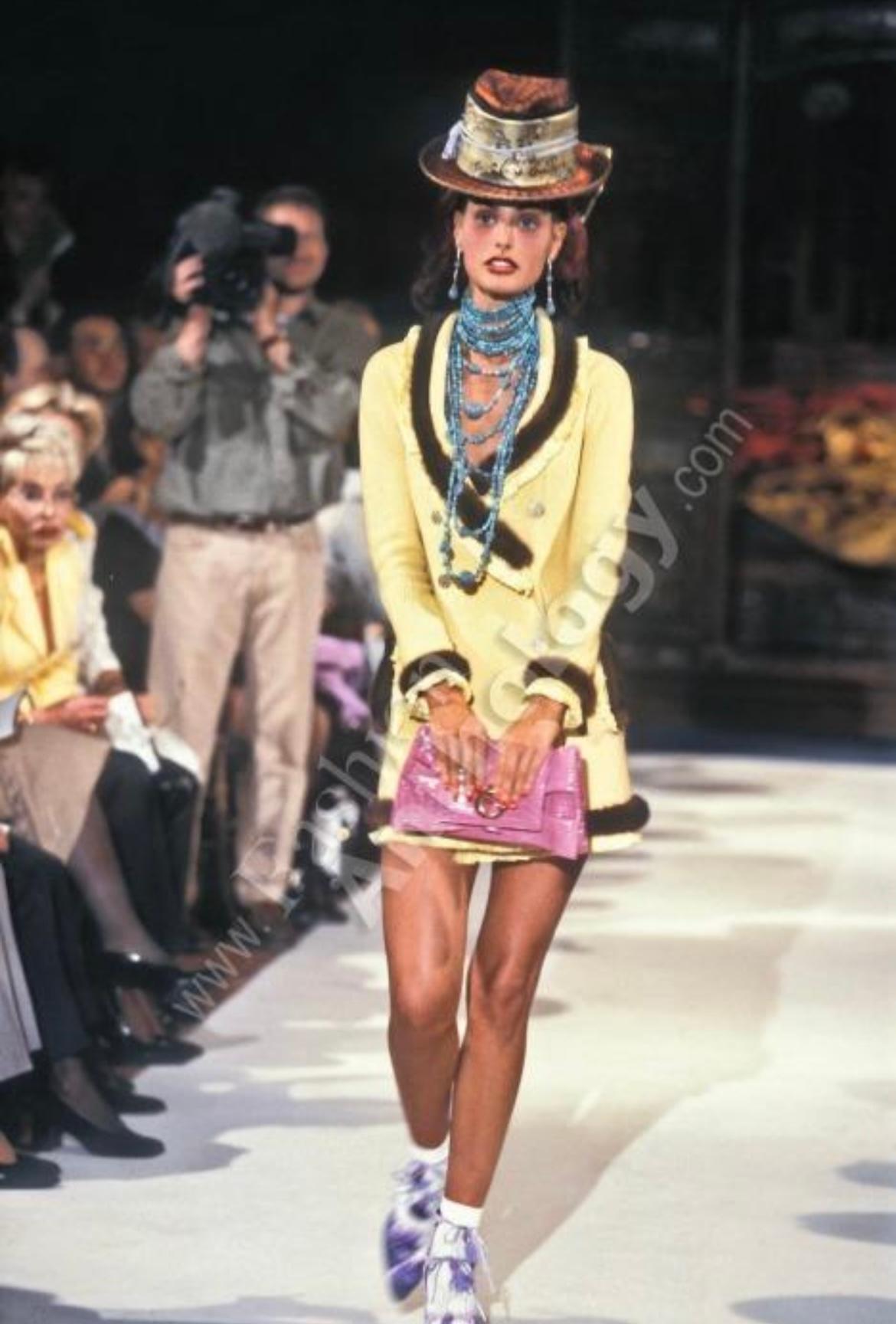 Christian Dior by John Galliano yellow dress from Spring Summer 1997 collection as seen in the runway. The dress is made with a basket weave wool technique and has fringe trimming. The dress is inspired by the iconic Bar jacket created by Christian