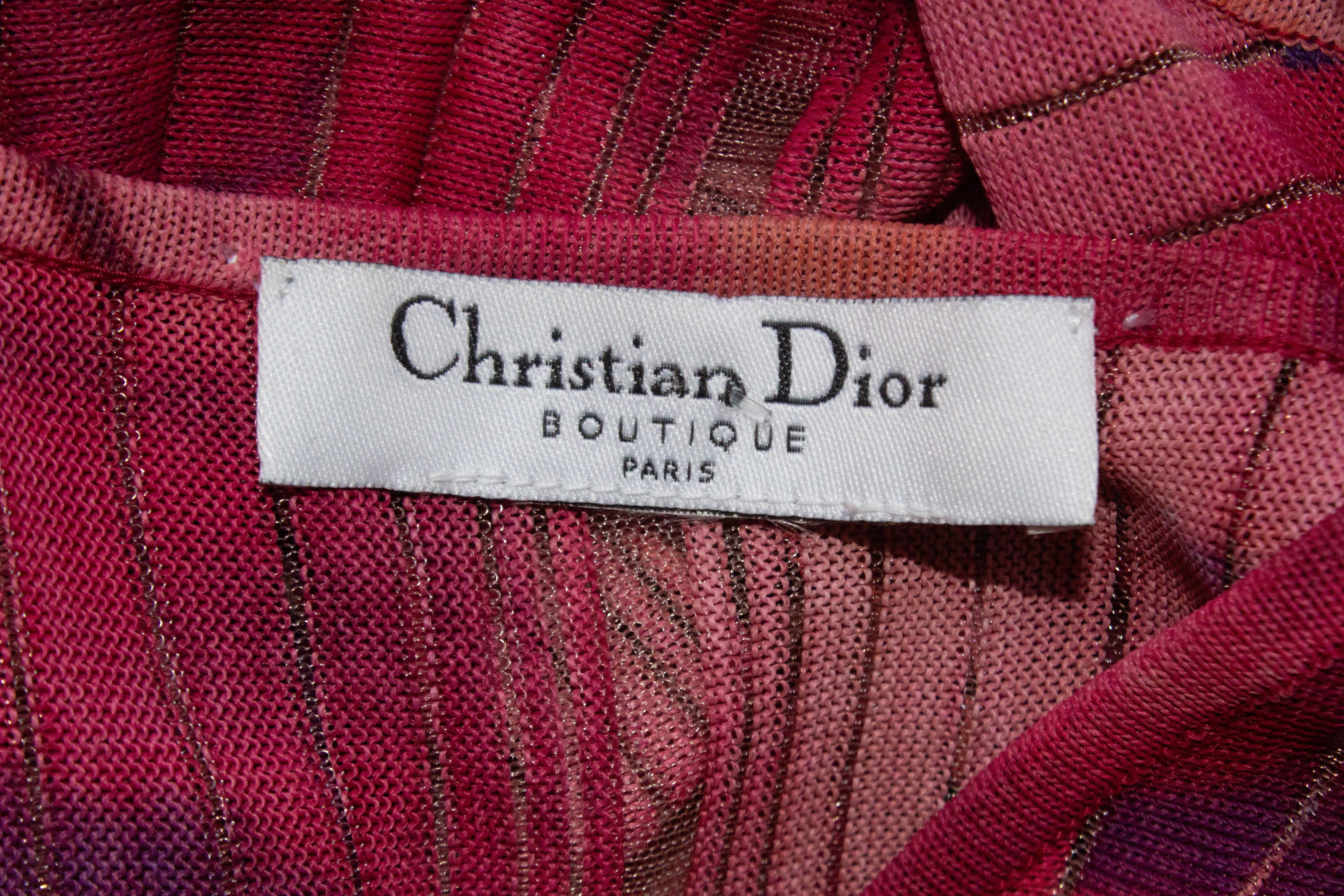 Christian Dior by John Galliano dress, from the Spring/Summer 2001 collection. Features a semi sheer pink fabric, with asymmetric hem. 

Condition
Excellent. Size and composition label removed, please see approximate measurements

Approximate