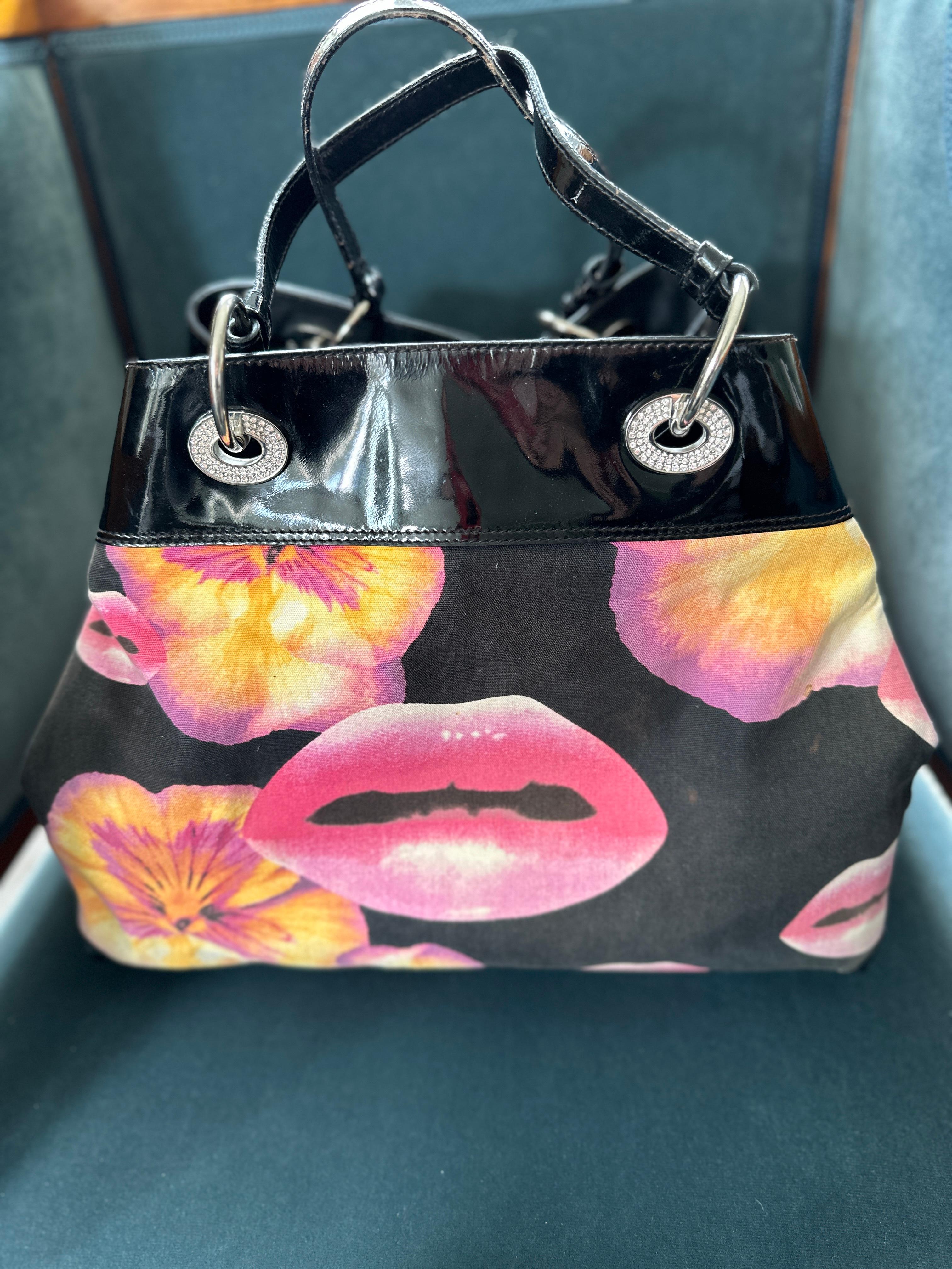 Christian Dior Spring 2005 Surreal Lips and Pansy Print Bag by John Galliano
Excellent pre owned condition, the patent leather shows minor wear
13