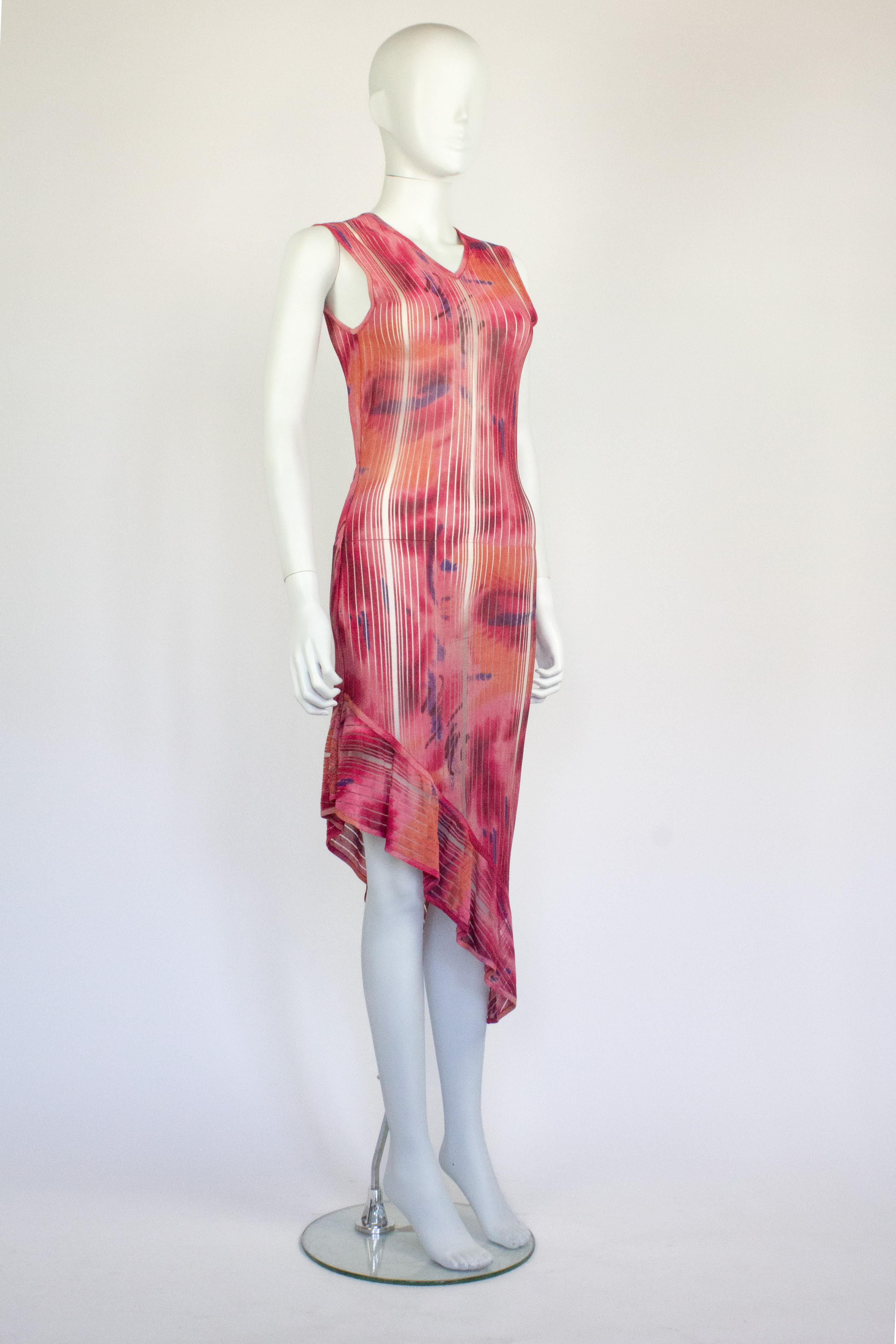 Christian Dior by John Galliano dress, from the Spring/Summer 2001 collection. Features a semi sheer pink fabric, with asymmetric hem.

Condition
Excellent. Size and composition label removed, please see approximate measurements

Approximate