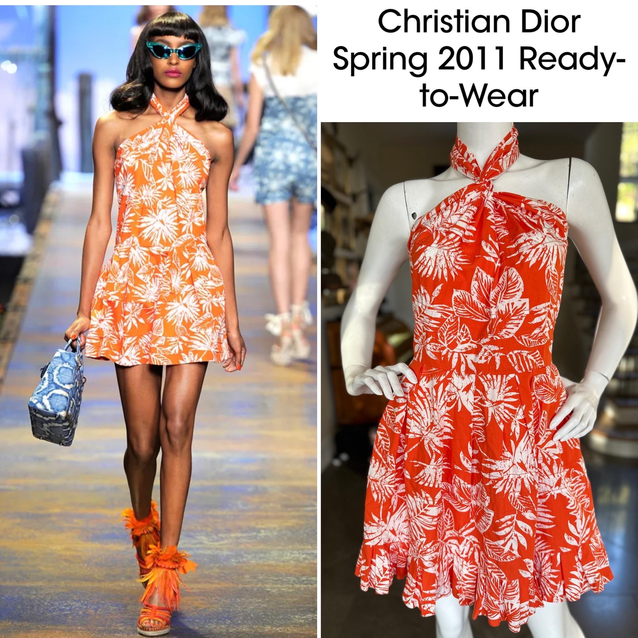 Christian Dior Spring Summer 2011 by John Galliano Cotton Sun Dress.
Bold flowers , this is such a joyous dress.
Galliano was interviewed by Tim Blanks for Style dot com after the show and he said he was inspired by watching the movie South Pacific,