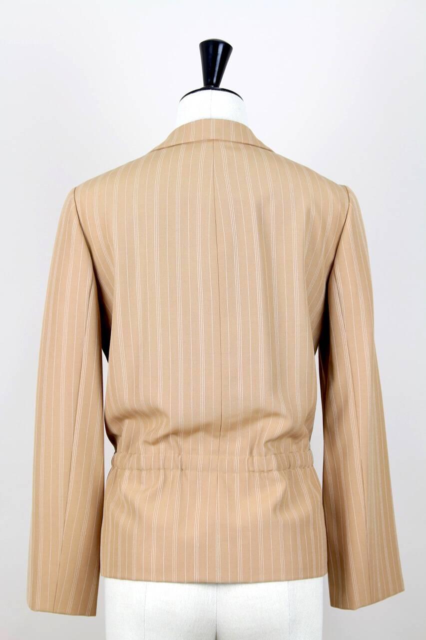 Exquisite documented (see last photo) Christian Dior Haute Couture pinstriped jacket. This jacket was designed by Marc Bohan for the Christian Dior Haute Couture Spring/Summer 1976 collection. It is entirely done by hand to Haute Couture standards