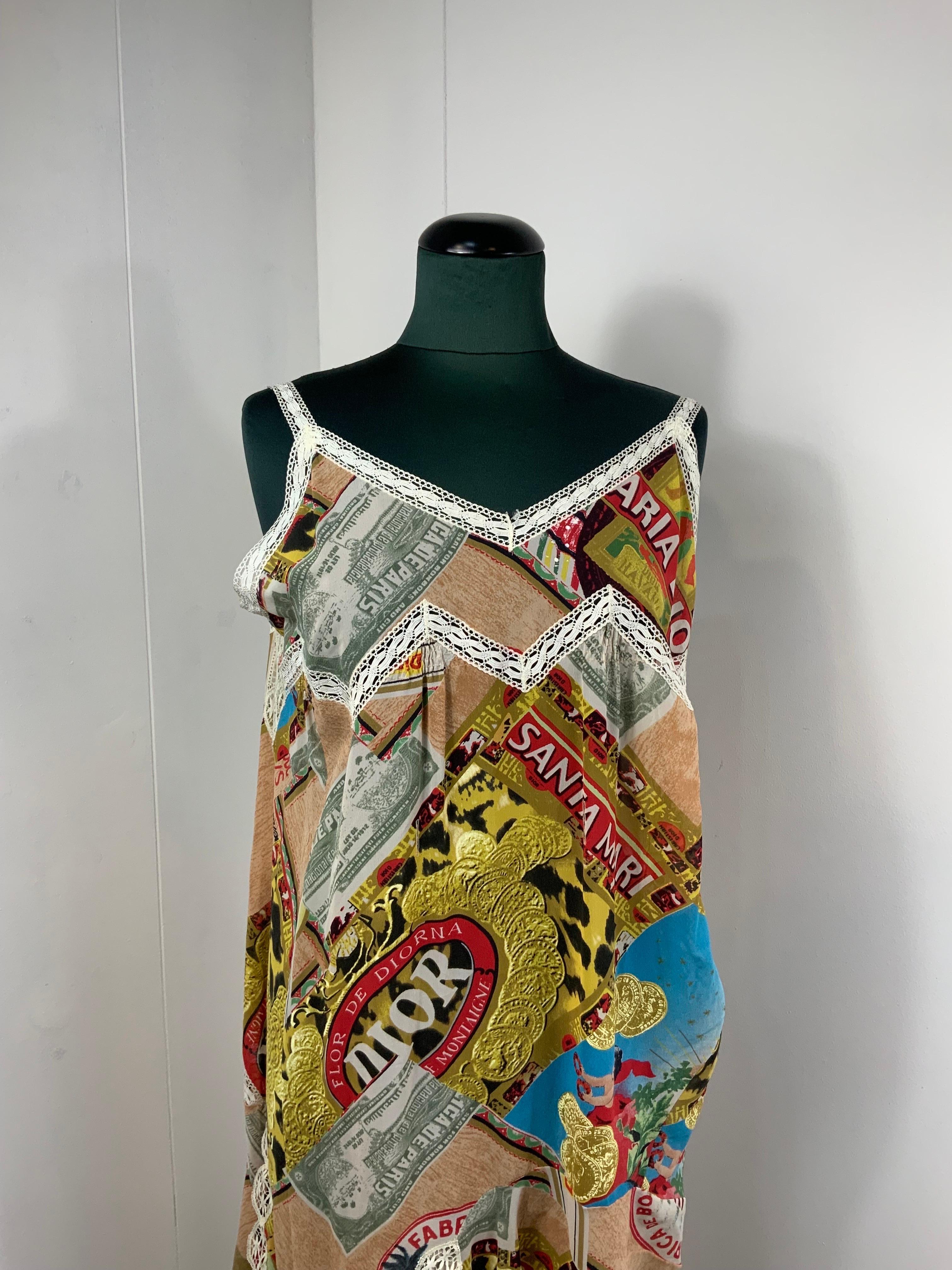 Christian Dior Dress. 
By John Galliano. SS 2002.
100% silk, cotton details. Iconic pattern. 
Dress can be worn with 2 different styling. As seen in photos. 
Size 38 FR.
Conditions: very good, it shows normal use signs. The dress was born with a