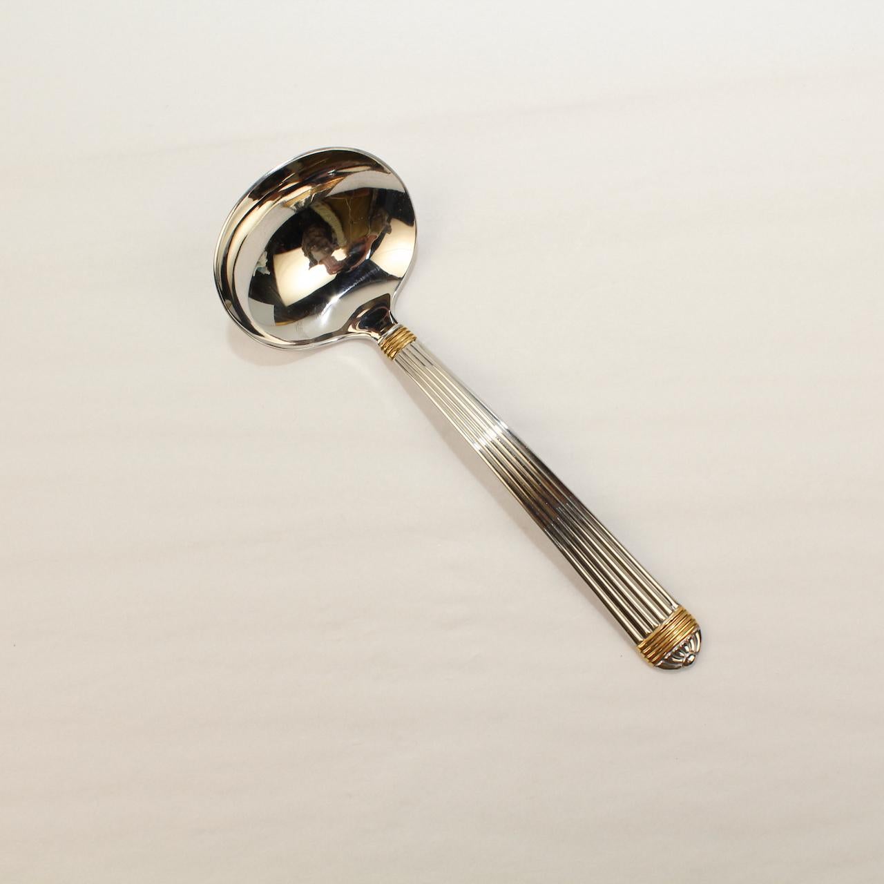 Late 20th Century Christian Dior Stainless Steel Gaudron Flatware with Gold Accent Service for 18