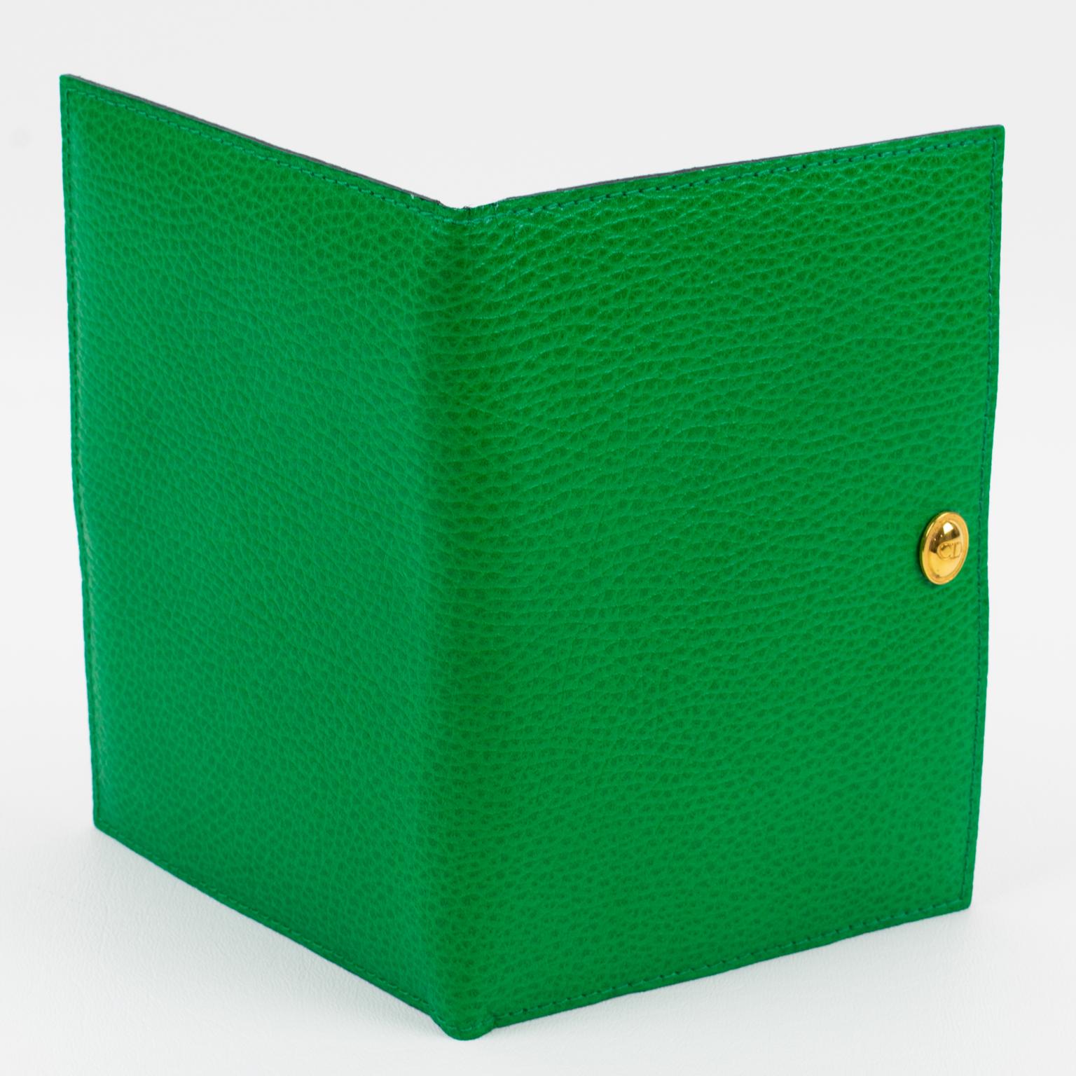 Christian Dior designed this sophisticated leather picture photo frame for its Home Collection in the 1990s. The lovely bright green leather with a pattern has a hand-stitched finish, all around. This double-view folding wallet-shaped frame is