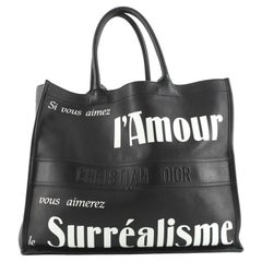 Christian Dior Surrealismus Buch-Tasche aus bedrucktem Leder