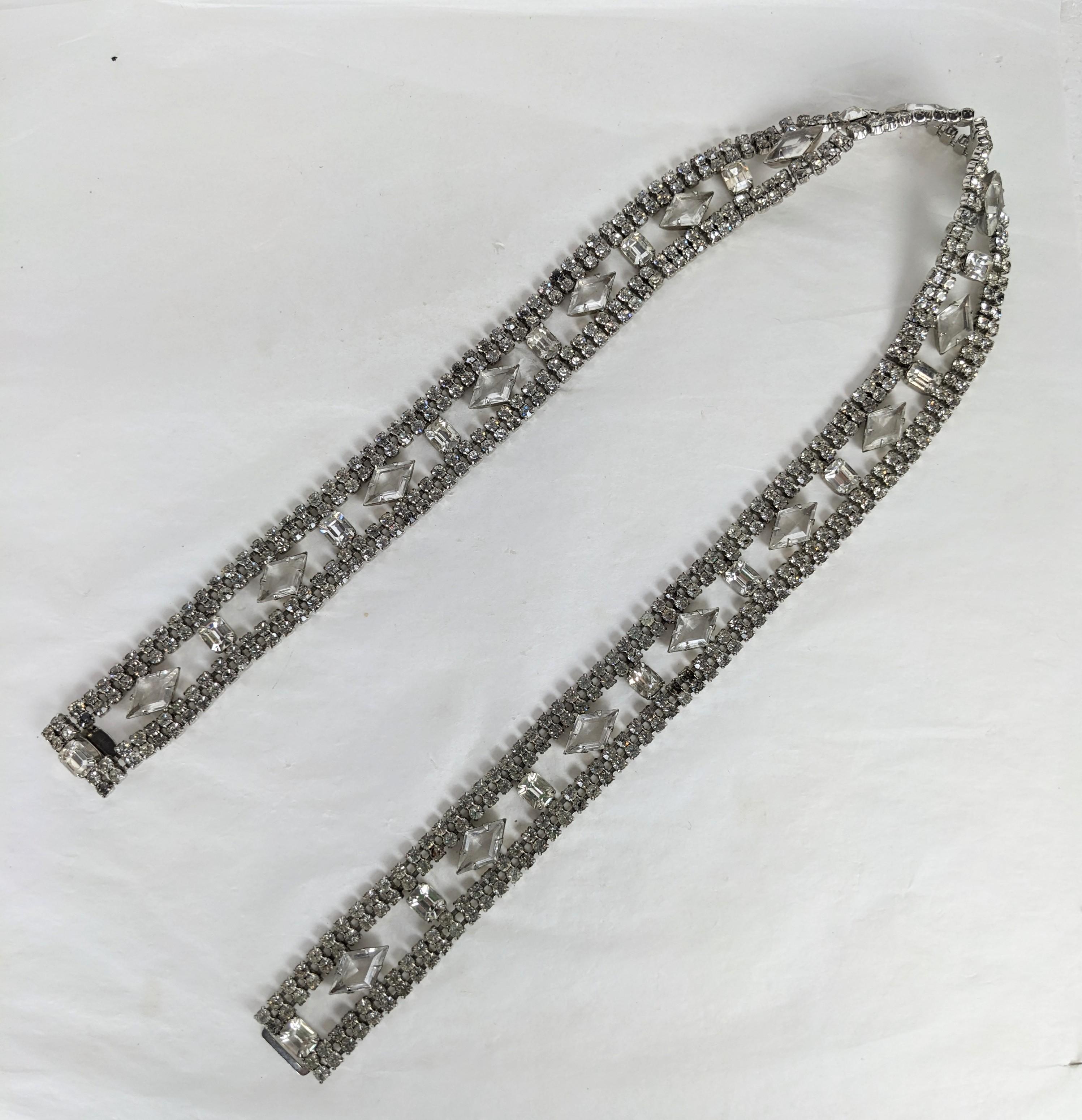 Vintage Christian Dior Swarovski Crystal Belt from the 1970's. Unusual configuration with flexible rounds crystals set with diamond and emerald shaped crystals in the center. Beautiful quality construction. Hand made, Signed 