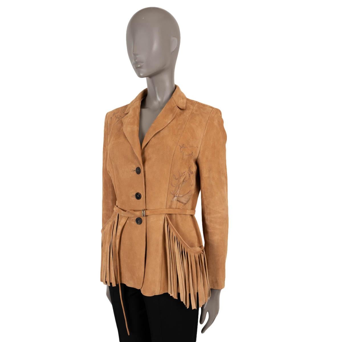 100% authentic Christian Dior Bar jacket in beige suede (100%). Features native American hand painted art, fringe trims and matching belt. Closes with buttons on the front and is partially lined in cotton (100%). Has been worn and is in excellent